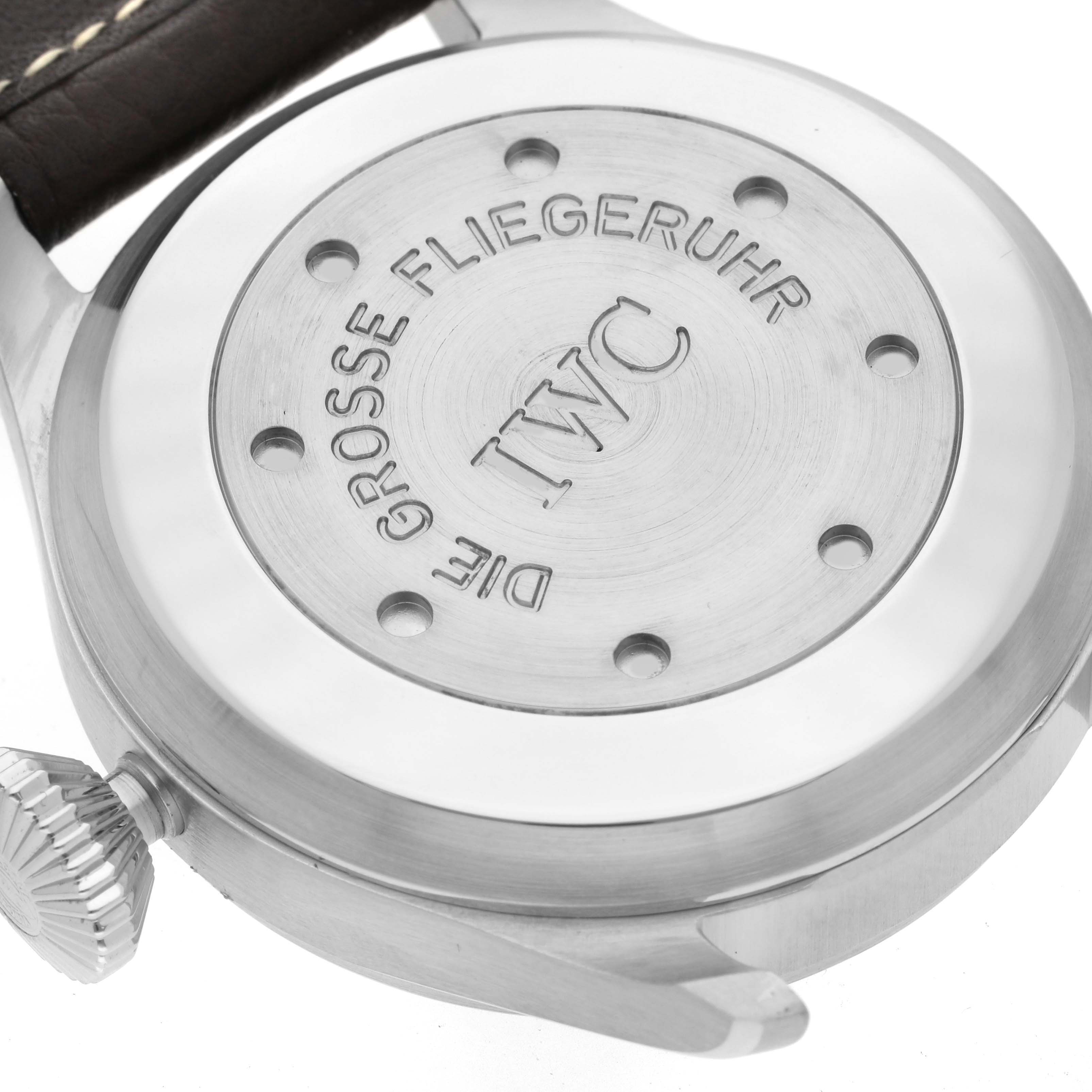 The image shows the case back and crown of the IWC Pilot IW500201 Men's Stainless Steel Black Dial IW500201 Men's Stainless Steel Black Dial watch, displaying the engravings and leather strap attachment.