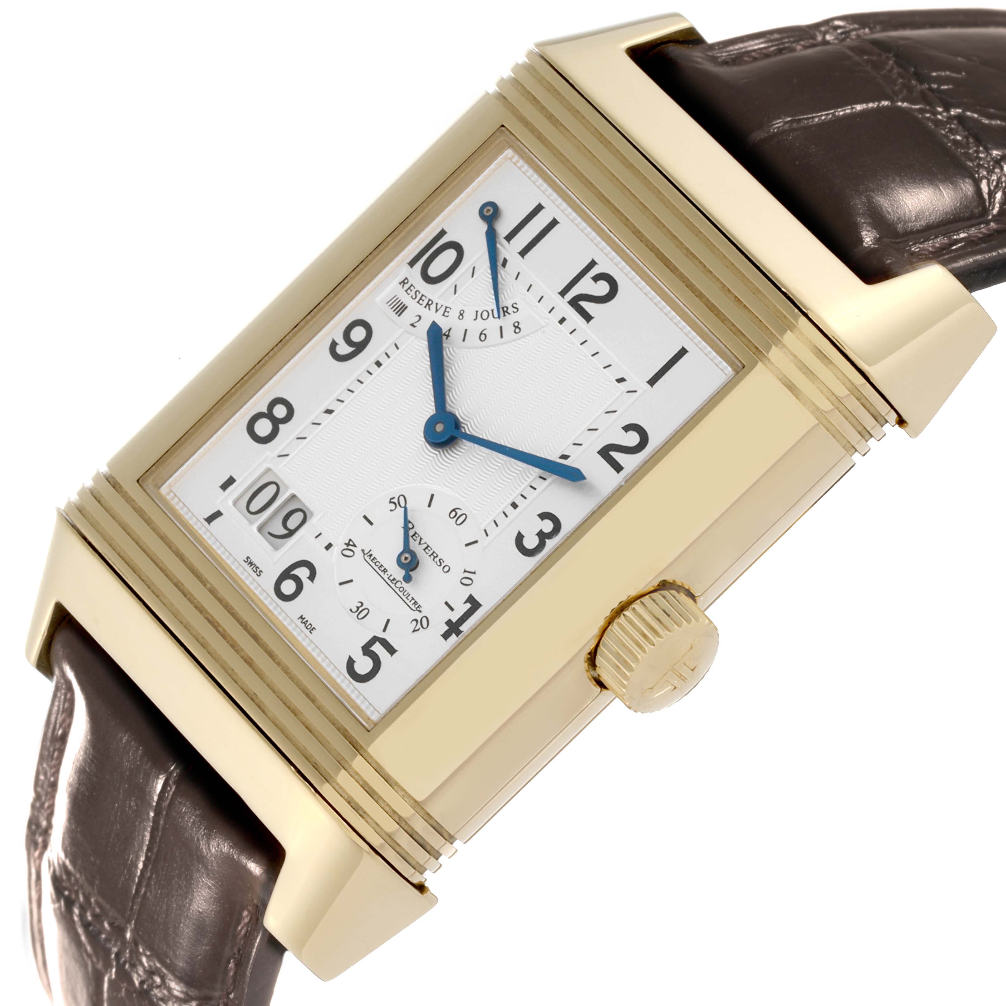 The image shows a close-up view of the Jaeger-LeCoultre Reverso watch, displaying its face, crown, and part of its leather strap.