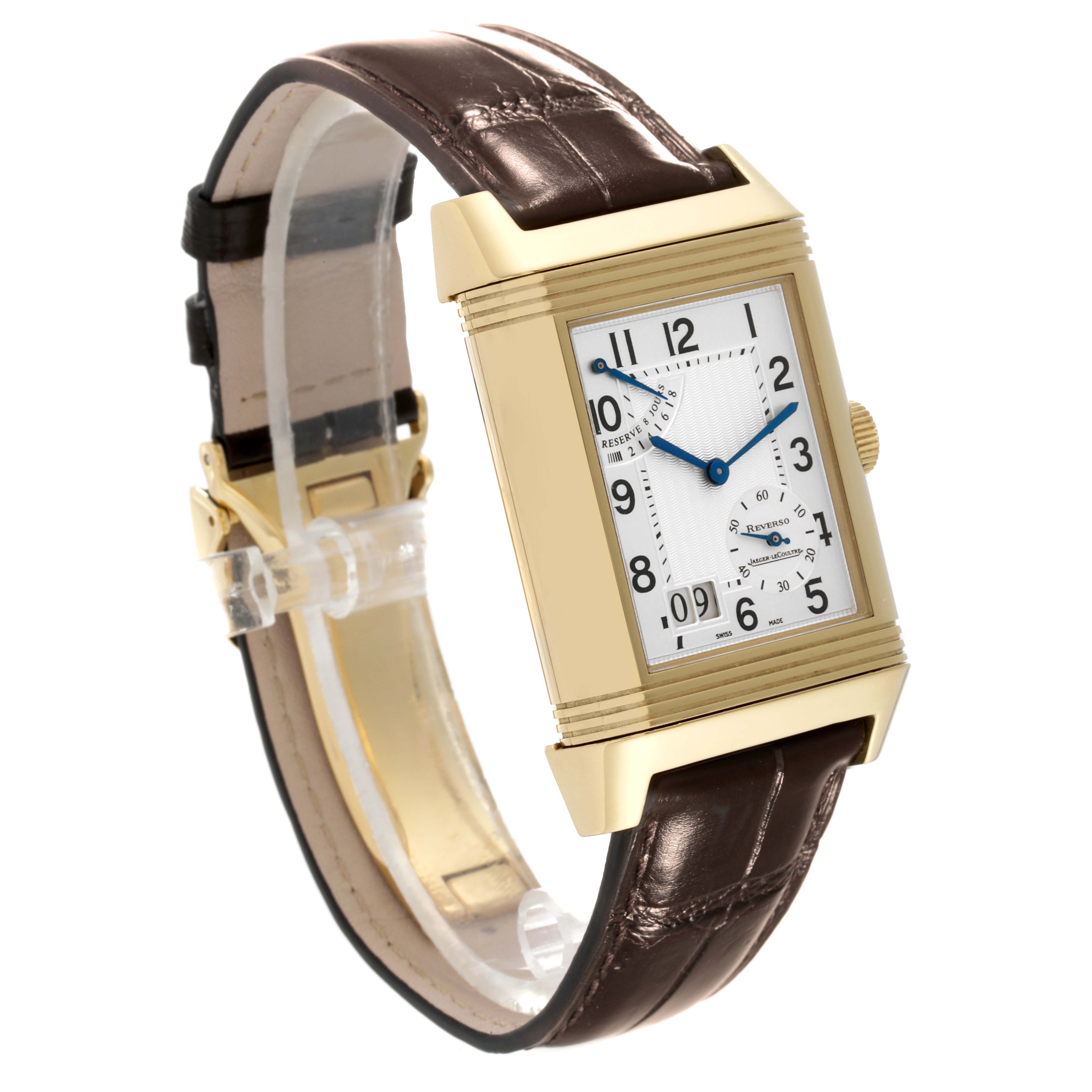 The Jaeger LeCoultre Reverso Q3001420 Men's Yellow Gold Silver Dial Q3001420 Men's Yellow Gold Silver Dial watch is shown at a front angle, displaying its rectangular dial and brown leather strap.