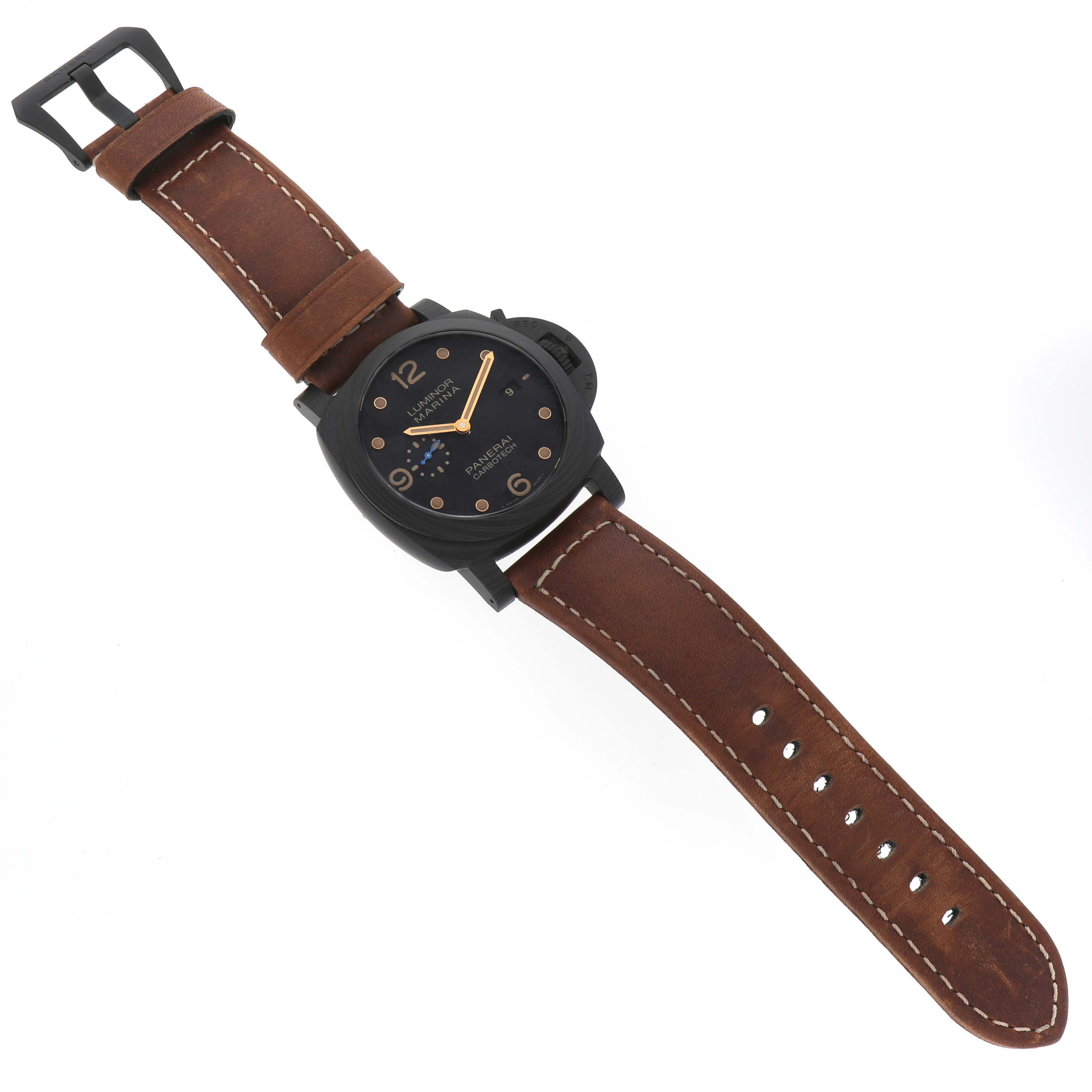 The Panerai Luminor PAM00661 Men's Titanium Black Dial PAM00661 Men's Titanium Black Dial watch is shown from a top-down angle, highlighting its black dial, case, and brown leather strap.