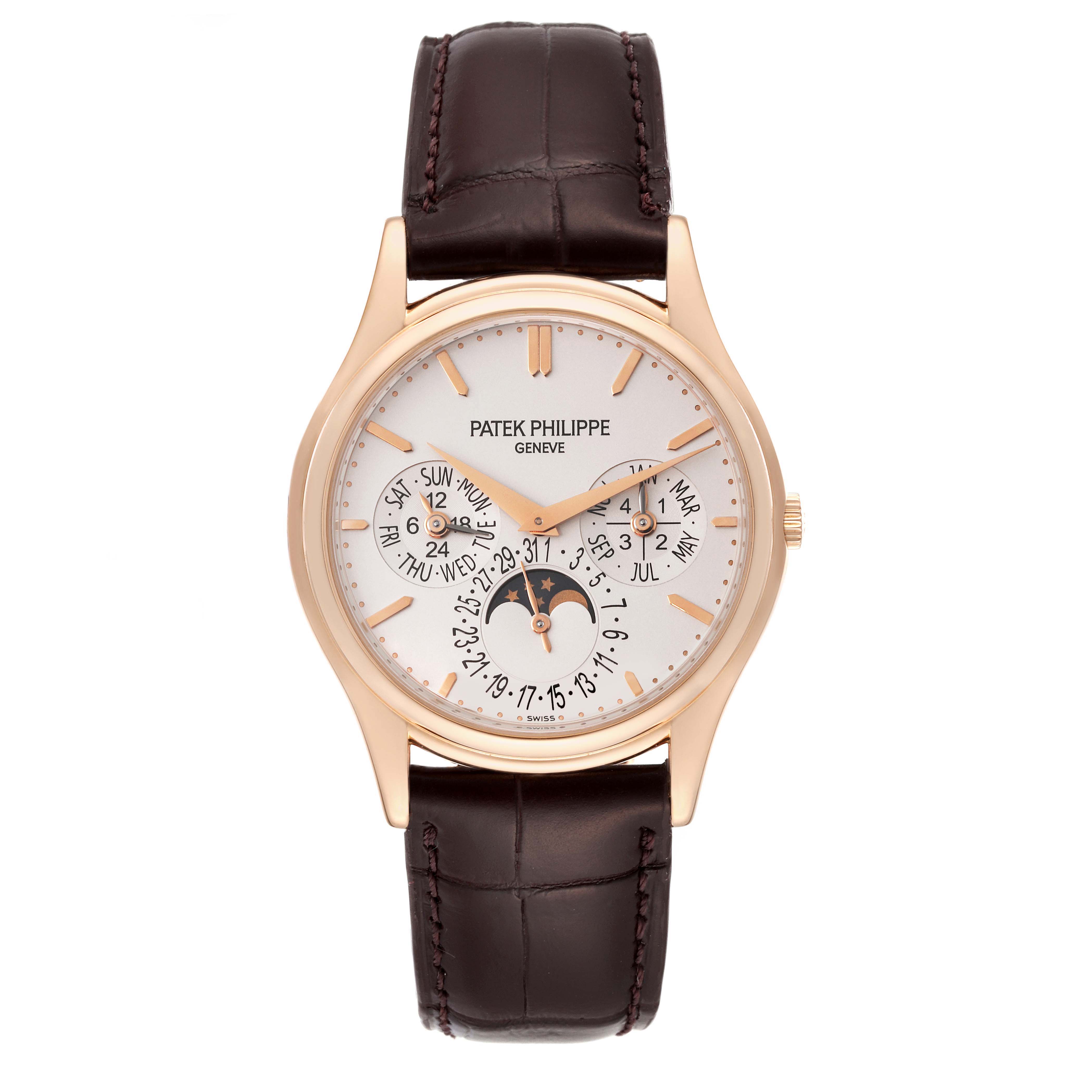 The Patek Philippe Complications model 5140R-001 is shown from a top-down angle, displaying its dial, gold case, and brown leather strap.