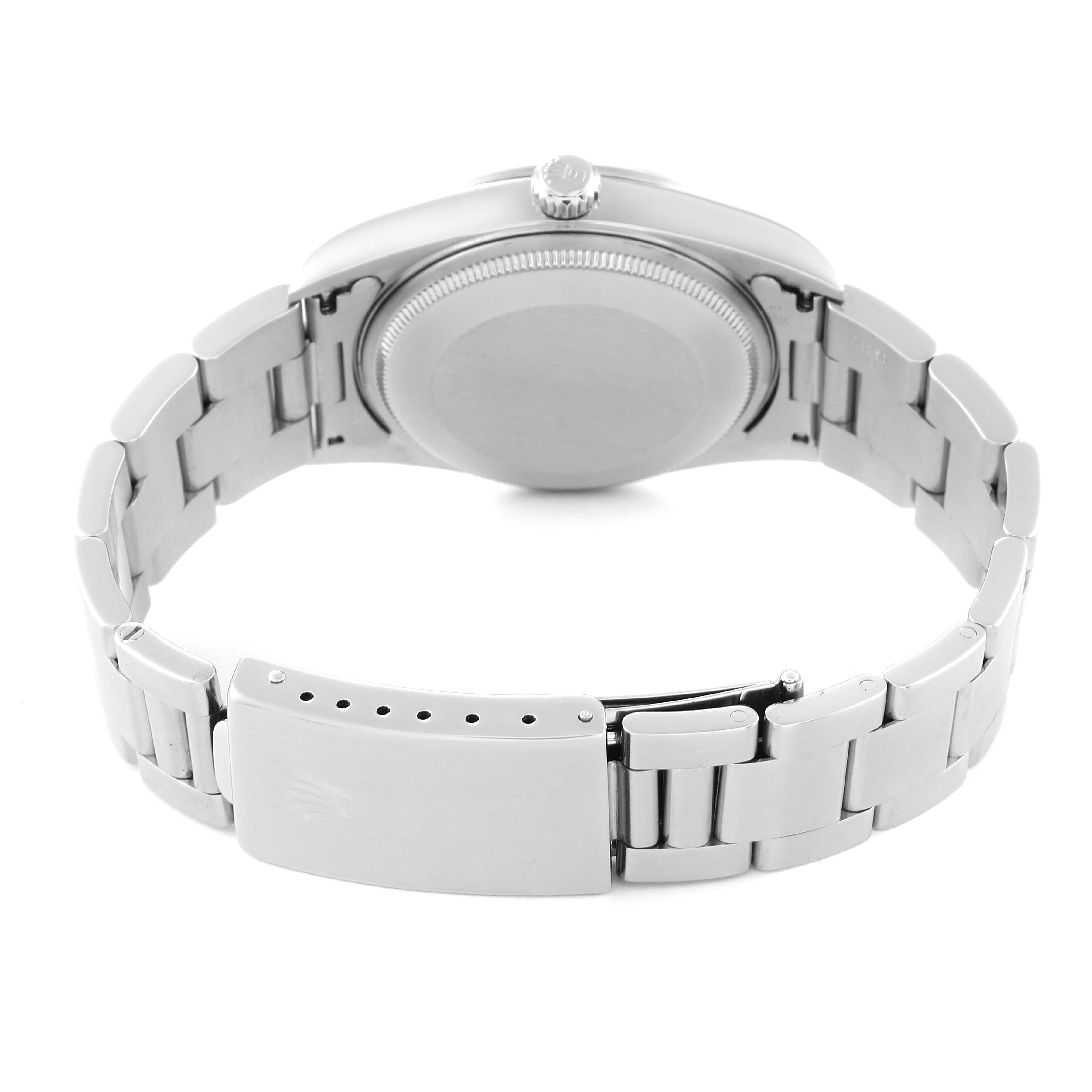 The image shows the back view of a Rolex Air-King 14000 Men's Stainless Steel Blue Dial 14000 Men's Stainless Steel Blue Dial watch, highlighting the case, crown, and metal bracelet with the clasp open.