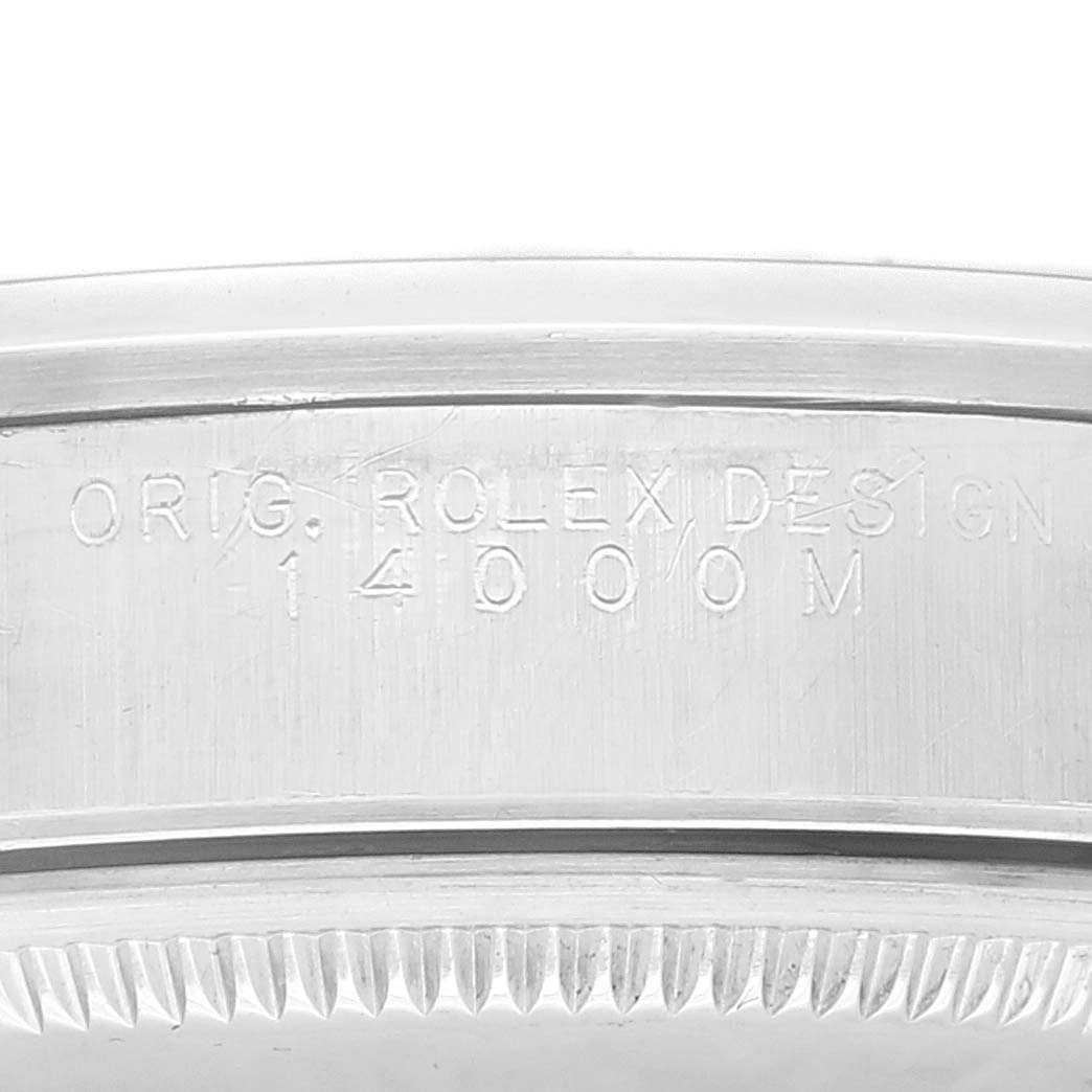 The image shows a close-up view of the case back engraving on a Rolex Air-King 14000 Men's Stainless Steel Blue Dial 14000 Men's Stainless Steel Blue Dial watch, displaying the model number and "ORIG. ROLEX DESIGN."
