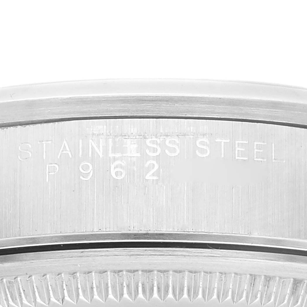 This close-up image shows the case back of the Rolex Air-King 14000 Men's Stainless Steel Black Dial 14000 Men's Stainless Steel Black Dial watch, highlighting the "Stainless Steel" engraving.