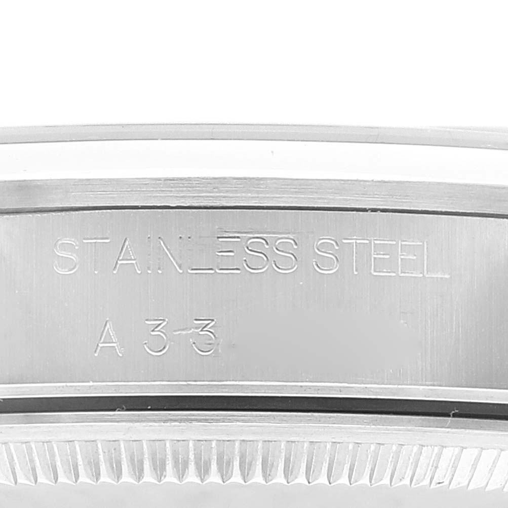 This image shows a close-up of the Rolex Air-King 14000 Men's Stainless Steel Blue Dial 14000 Men's Stainless Steel Blue Dial case back, highlighting the stainless steel engraving.