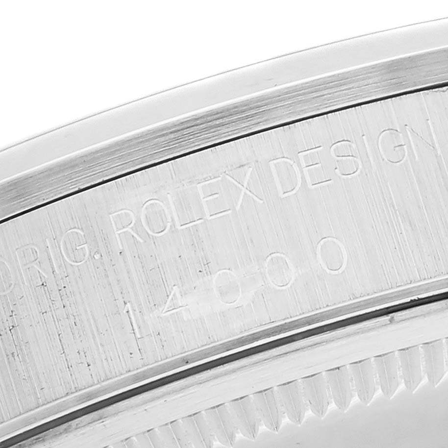 The image shows a close-up of the case engraving on a Rolex Air-King 14000 Men's Stainless Steel Silver Dial 14000 Men's Stainless Steel Silver Dial watch.