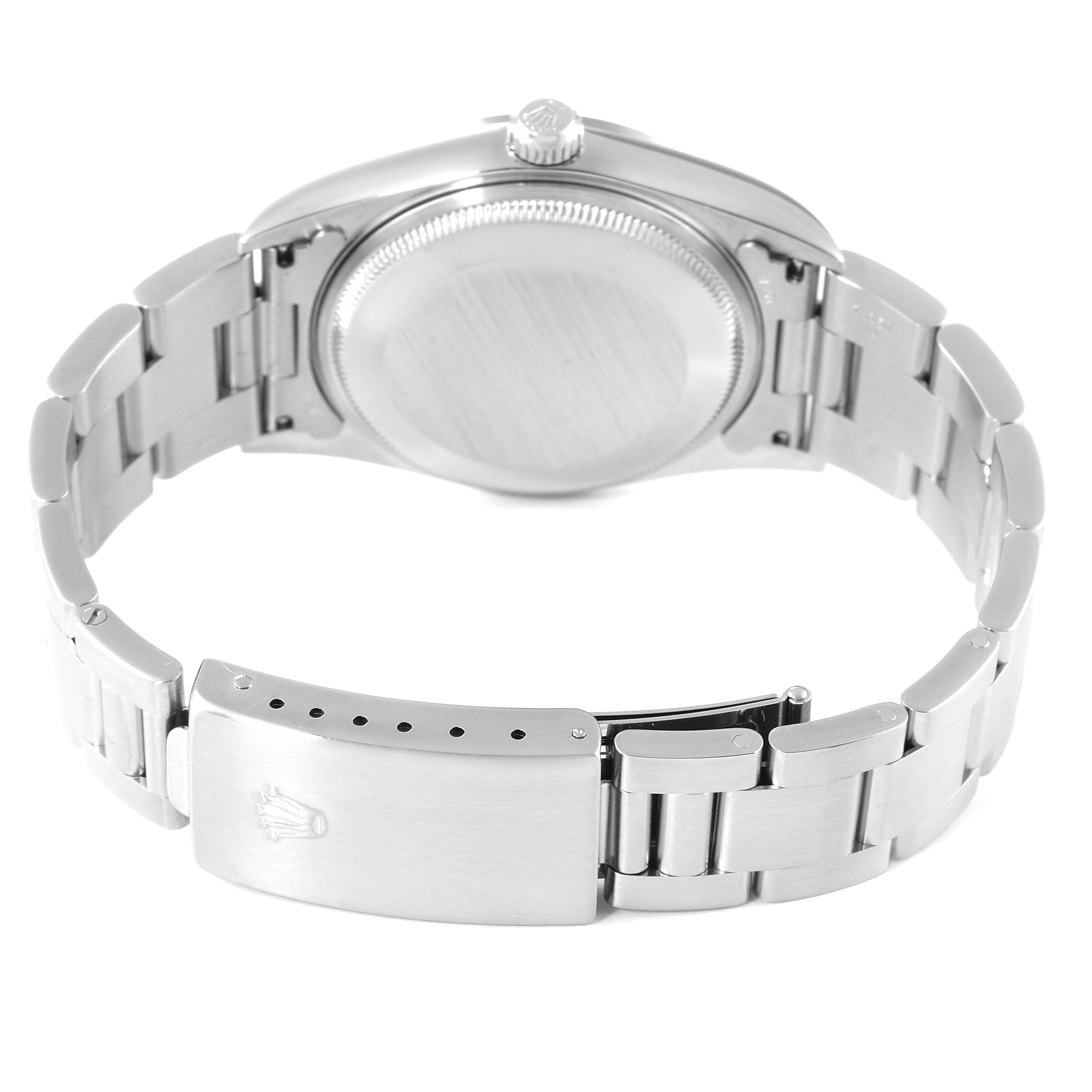 The image shows the back view of the Rolex Air-King 14000 Men's Stainless Steel Black Dial 14000 Men's Stainless Steel Black Dial watch, including its case back, crown, and metal bracelet with a clasp.