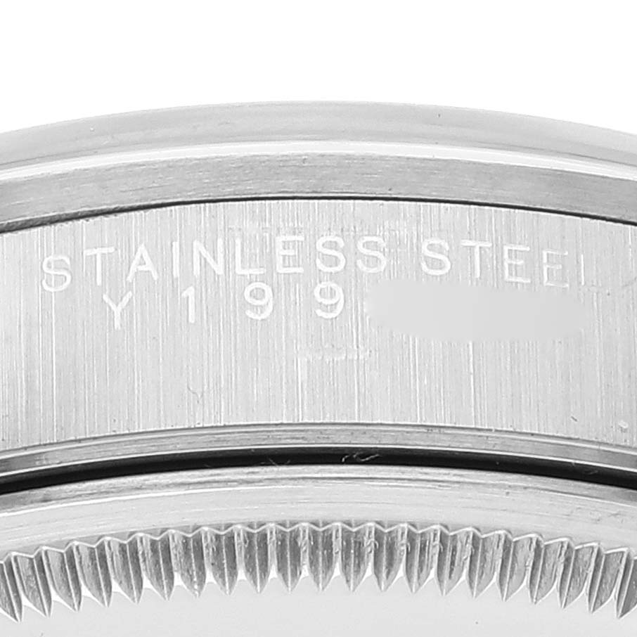 This image shows a close-up of the stainless steel case back and serial number of a Rolex Air-King 14000 Men's Stainless Steel Black Dial 14000 Men's Stainless Steel Black Dial watch.