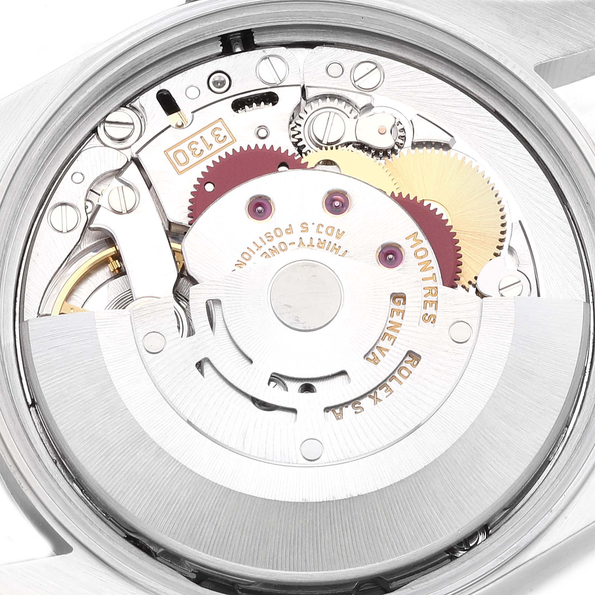 The image shows the internal mechanical movement of a Rolex Air-King 14000 Men's Stainless Steel Black Dial 14000 Men's Stainless Steel Black Dial watch from a top-down angle, highlighting gears and components.