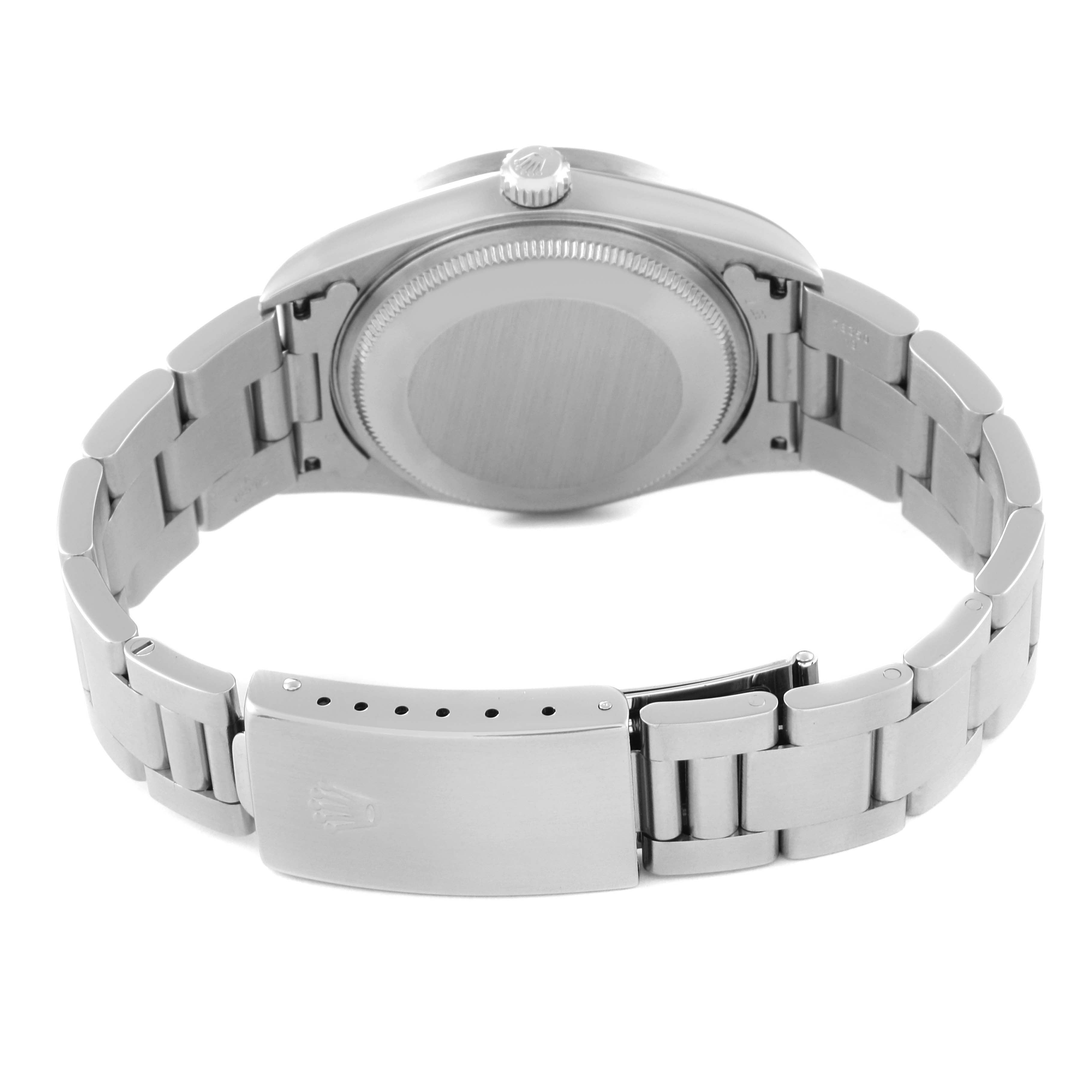 This image shows the back and clasp of a Rolex Air-King 14010 Men's Stainless Steel Black Dial 14010 Men's Stainless Steel Black Dial watch, highlighting the case back and stainless steel bracelet.