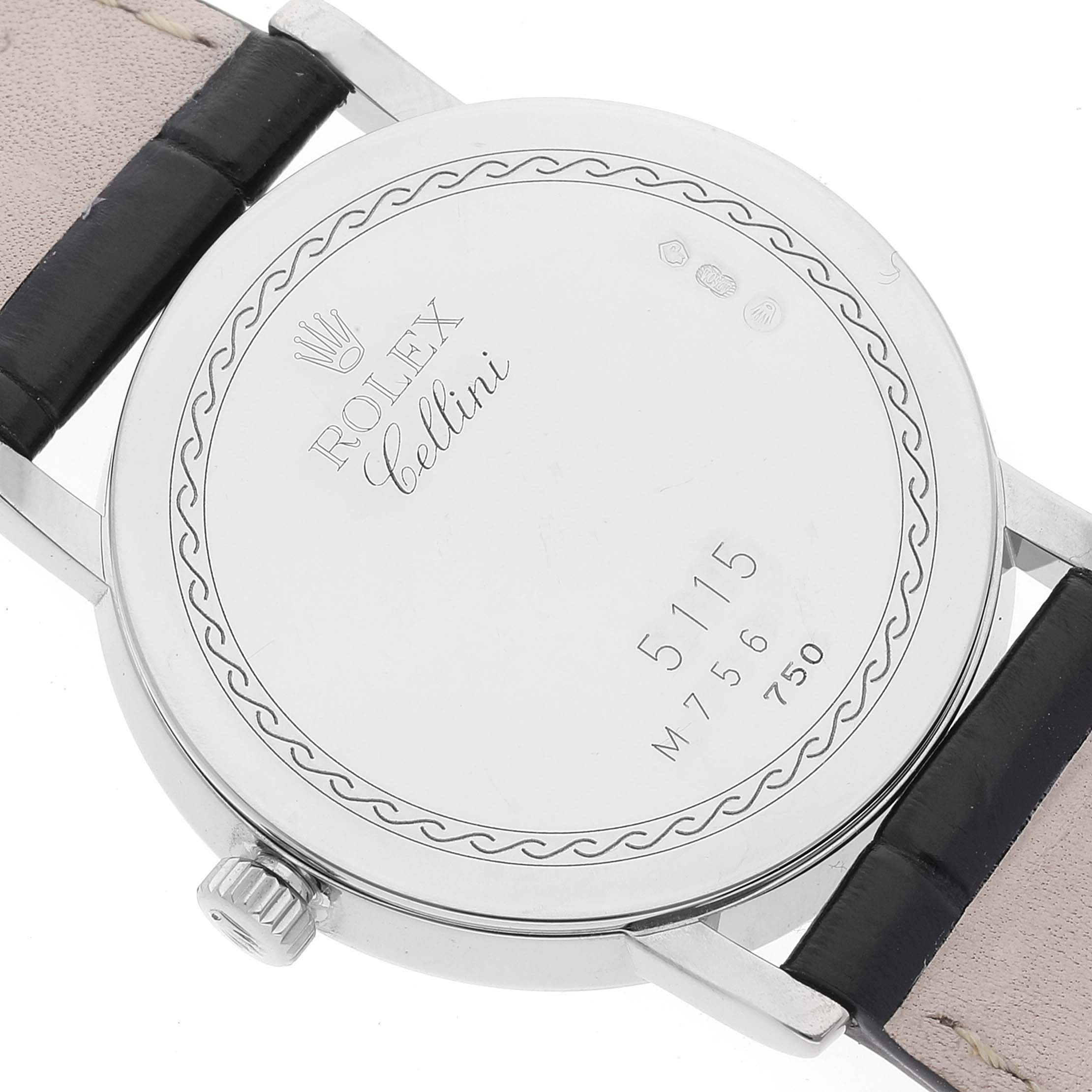 The image shows the back case of a Rolex Cellini 5115 Men's White Gold Grey Dial 5115 Men's White Gold Grey Dial watch, highlighting its serial number and branded engravings.
