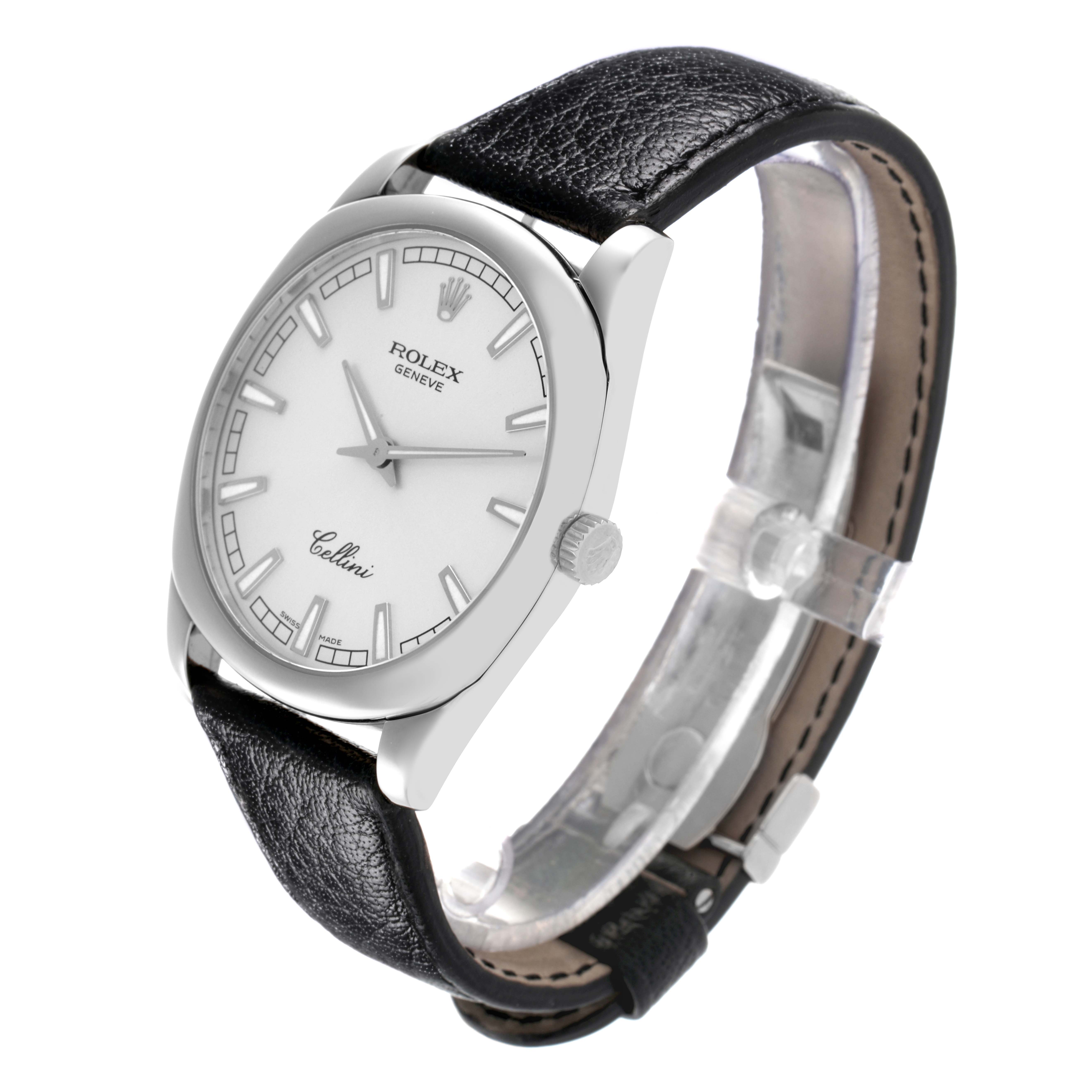 The Rolex Cellini model 4243/9 is shown at a three-quarter angle, displaying the watch face, bezel, crown, and leather strap.