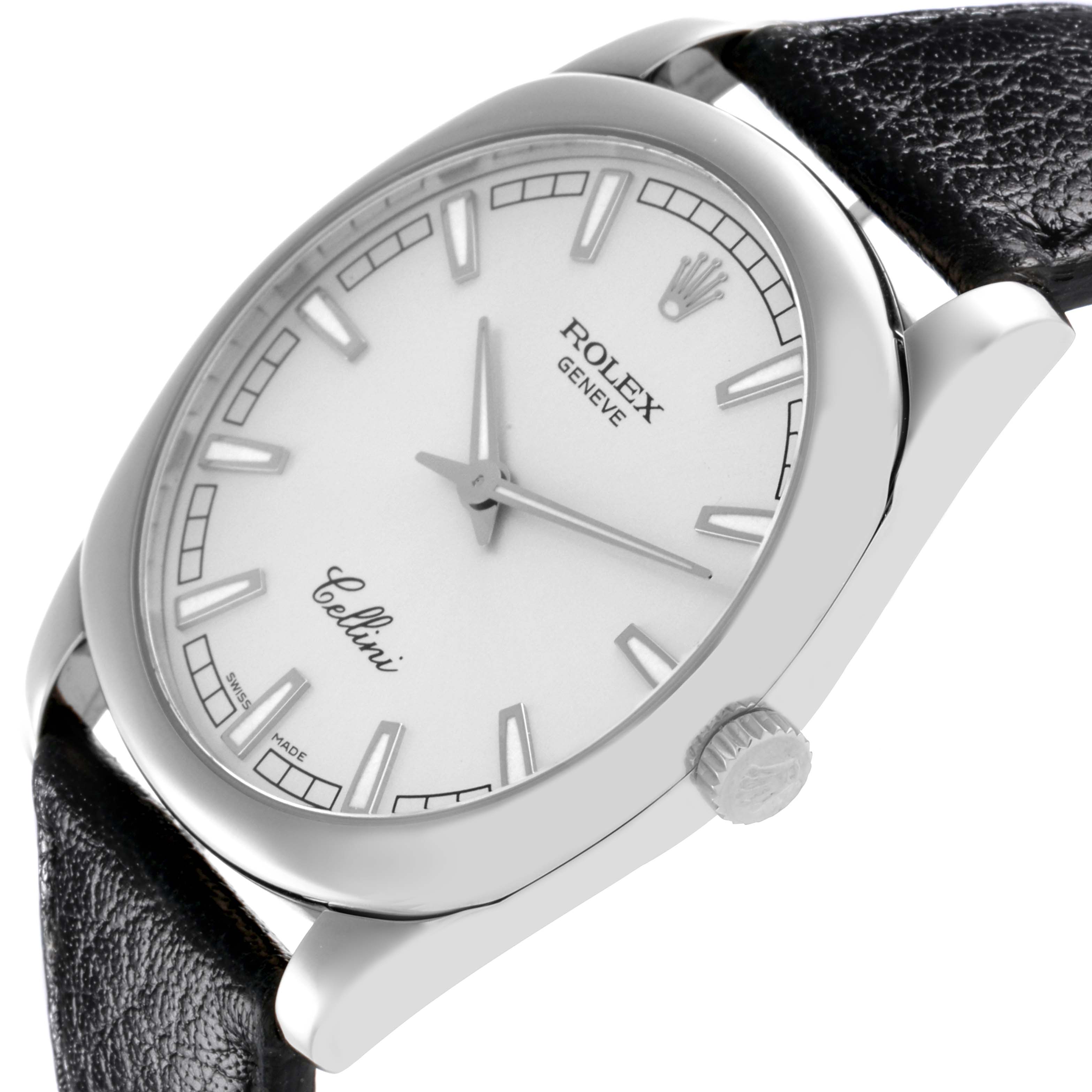 The image shows a Rolex Cellini model 4243/9 men
s watch at an angled side view, highlighting the dial, crown, and part of the leather strap.