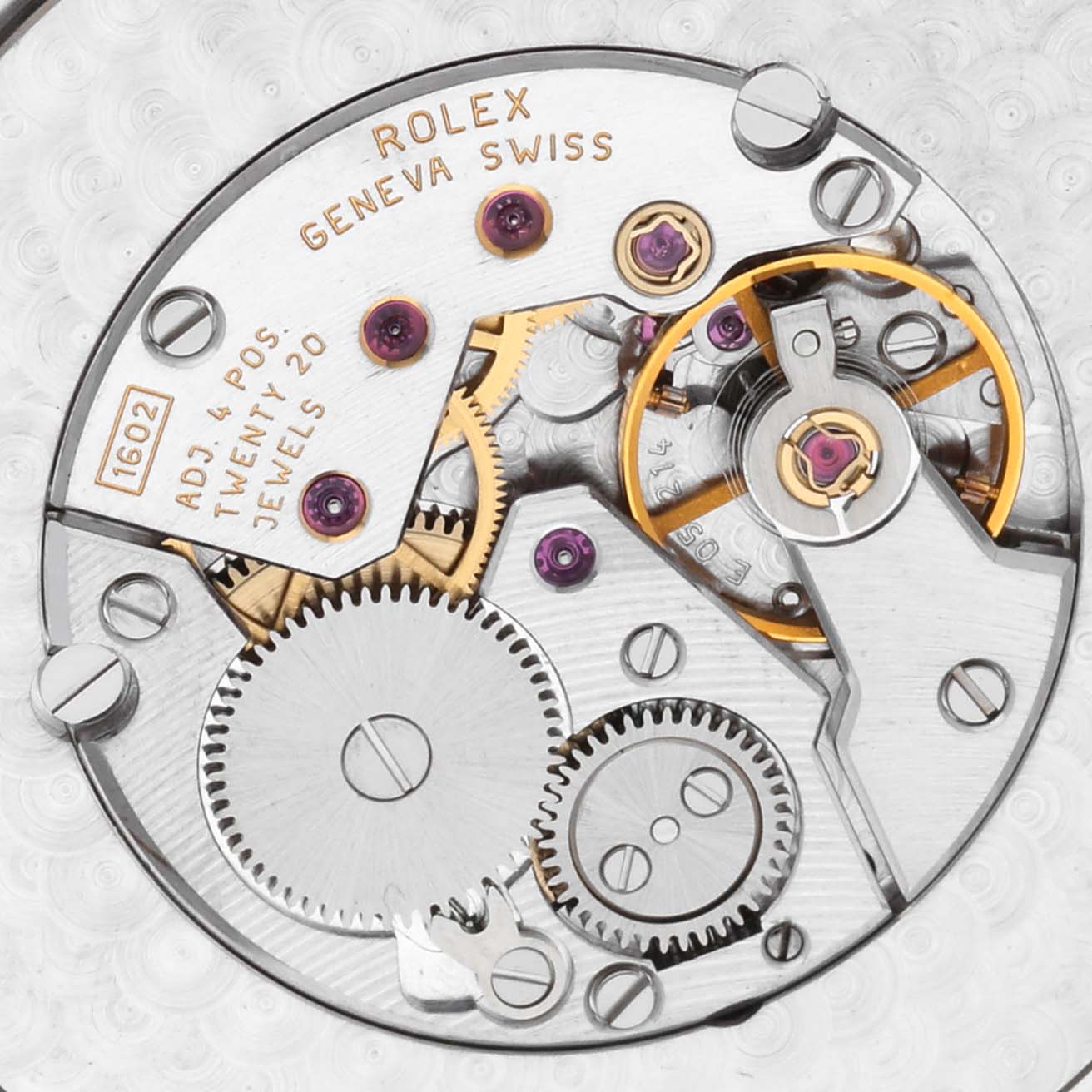 The image shows the movement mechanism of the Rolex Cellini model 4243/9 men
s watch, highlighting gears and jewels from a top-down perspective.