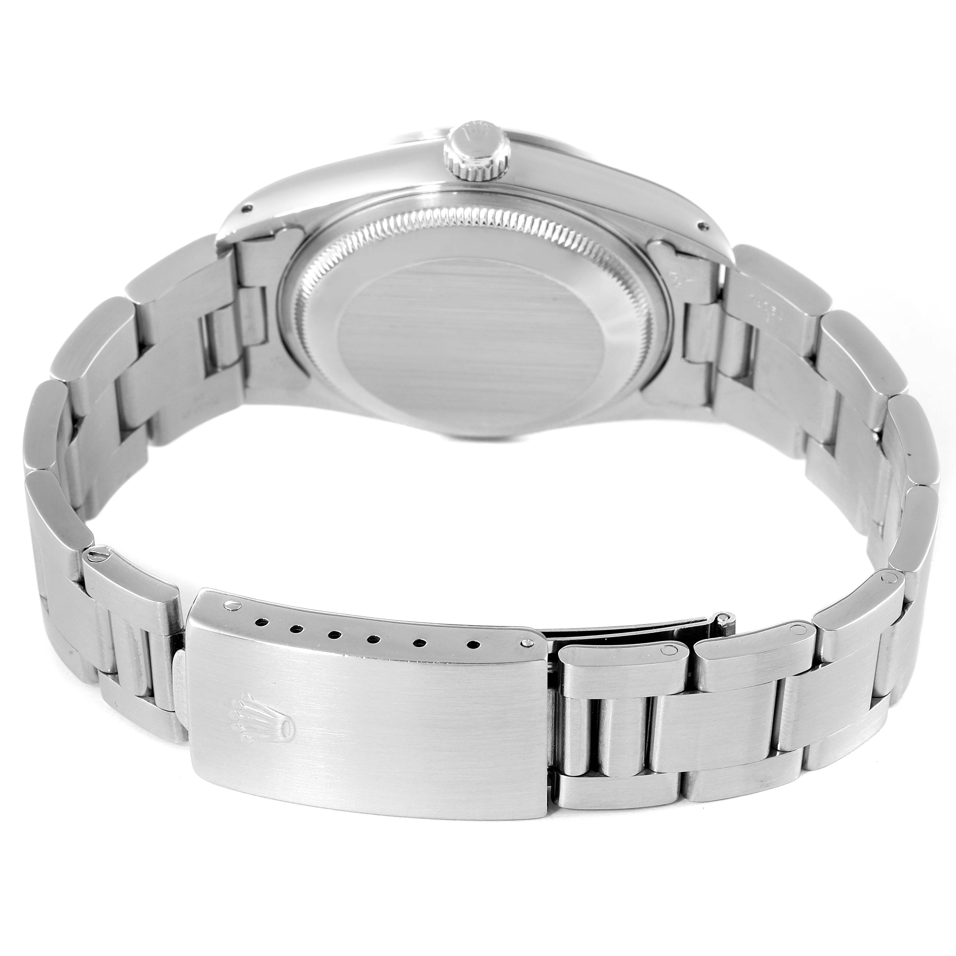 The image shows the back of the Rolex Date 15200 Men's Stainless Steel Grey Dial 15200 Men's Stainless Steel Grey Dial model watch and its metallic bracelet clasp.