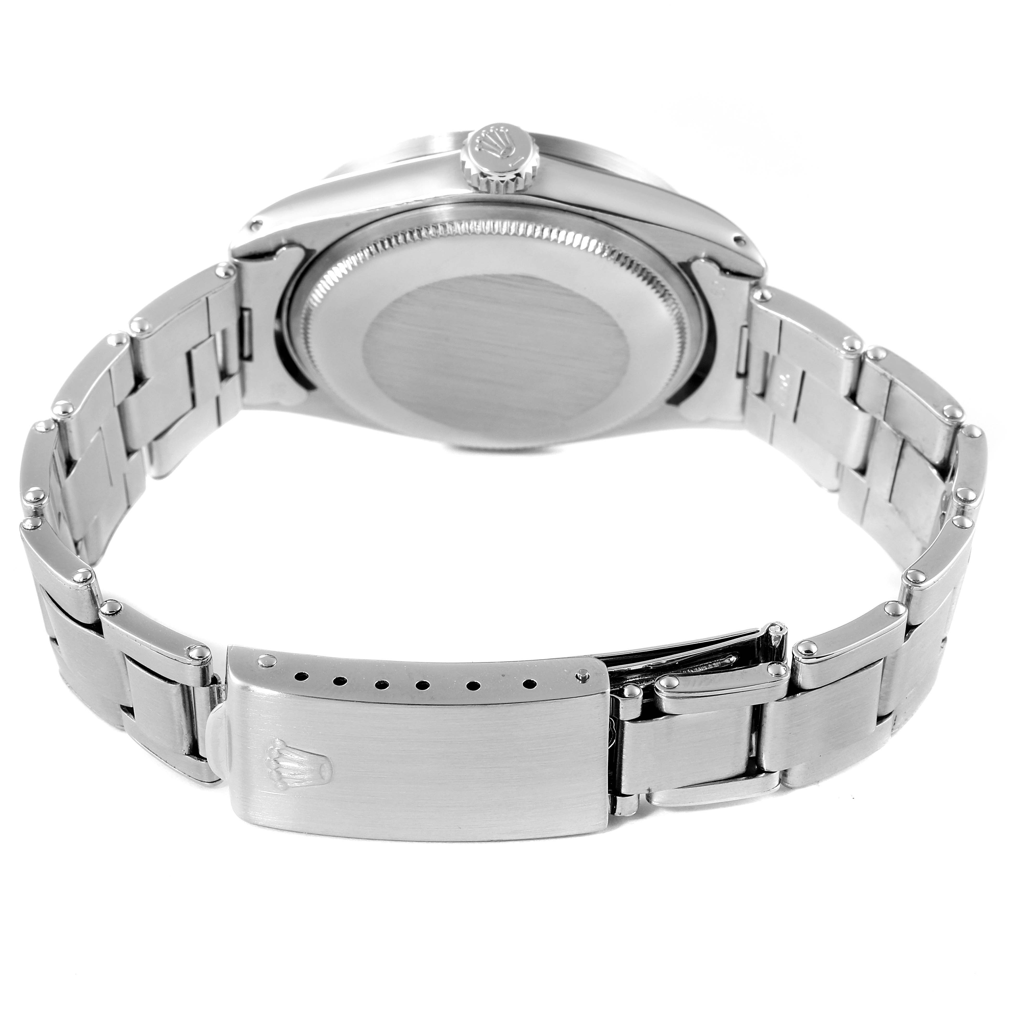 The image shows the back case and bracelet clasp of a Rolex Vintage Collection 1501 Men's Stainless Steel Silver Dial 1501 Men's Stainless Steel Silver Dial watch from a rear angle.