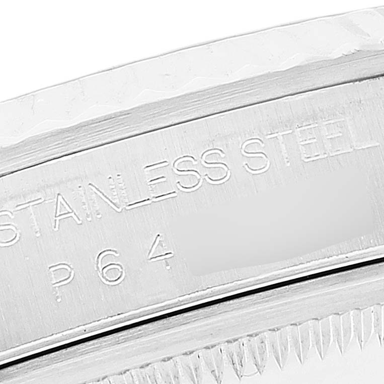 This image shows a close-up of the stainless steel material marking on the side of a Rolex Datejust 16234 Men's Stainless Steel Black Dial 16234 Men's Stainless Steel Black Dial watch case.