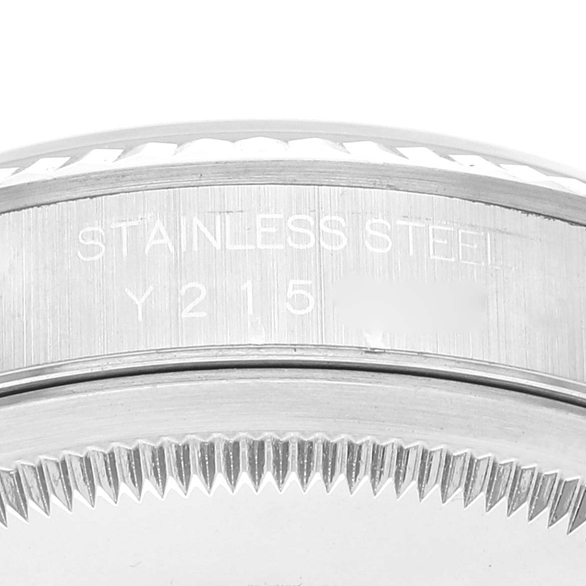This image shows a close-up of the case back and the edge of the bezel of a Rolex Datejust 16234 Men's Stainless Steel Black Dial 16234 Men's Stainless Steel Black Dial watch, highlighting the "STAINLESS STEEL" engraving.