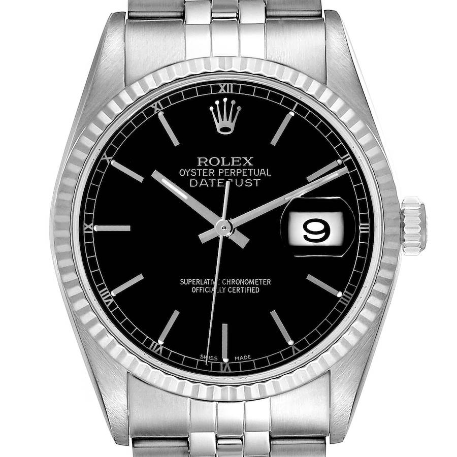 This is a front view of the Rolex Datejust watch, showing its black dial, date window, fluted bezel, and part of the bracelet.