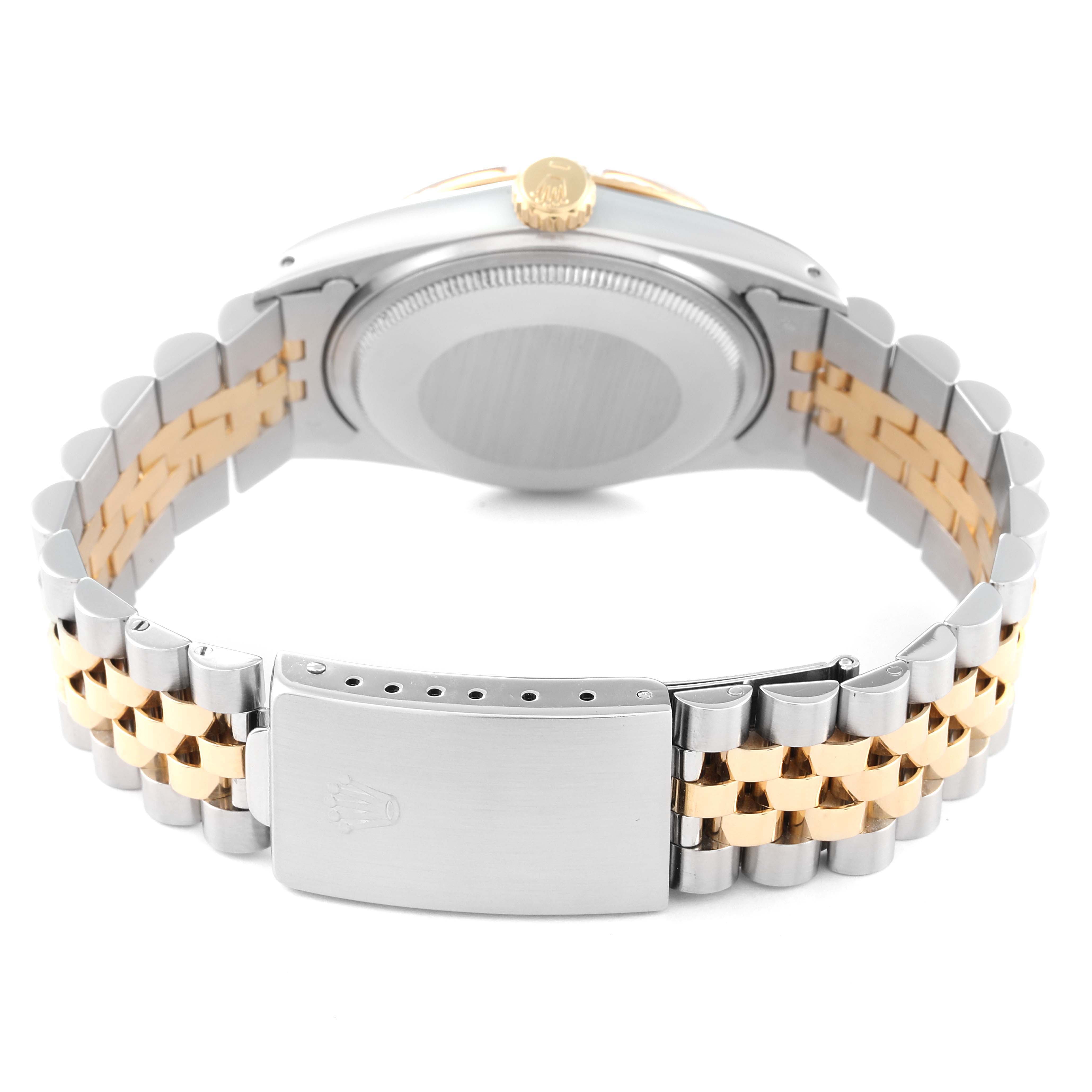 The image shows the back of a Rolex Vintage Collection 16013 Men
s Steel and Gold (two tone) Champagne Dial 16013 Men
s Steel and Gold (two tone) Champagne Dial watch highlighting the clasp, bracelet, case back, and crown.