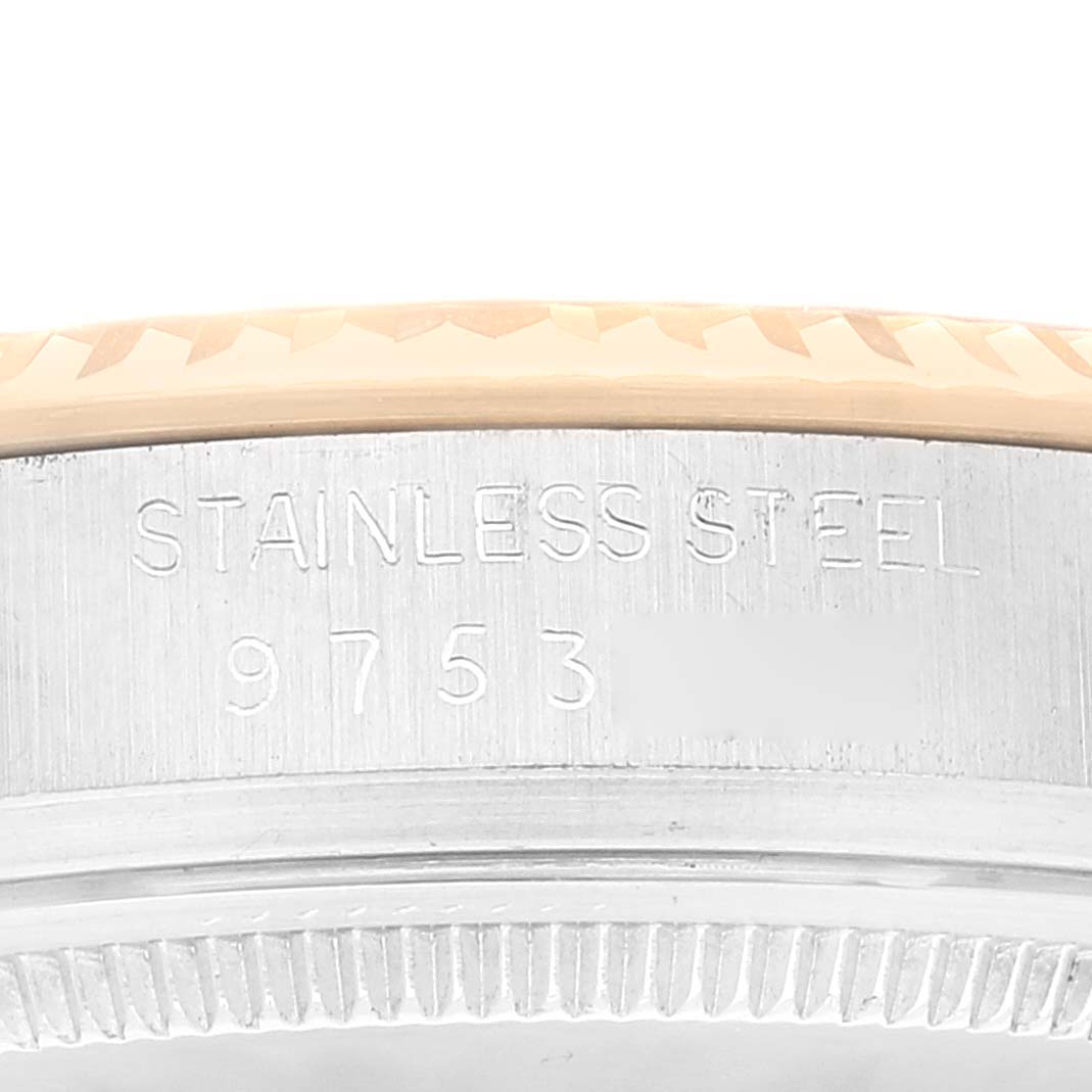 Close-up of the side of the Rolex Vintage Collection 16013 Men
s Steel and Gold (two tone) Champagne Dial 16013 Men
s Steel and Gold (two tone) Champagne Dial watch, showing the engraving "STAINLESS STEEL 9753".
