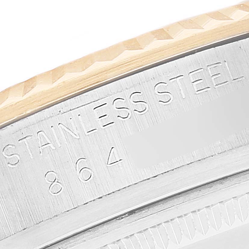 This close-up shows the engraved stainless steel case and partial bezel of a Rolex Vintage Collection 16013 Men
s Steel and Gold (two tone) Silver Dial 16013 Men
s Steel and Gold (two tone) Silver Dial watch.