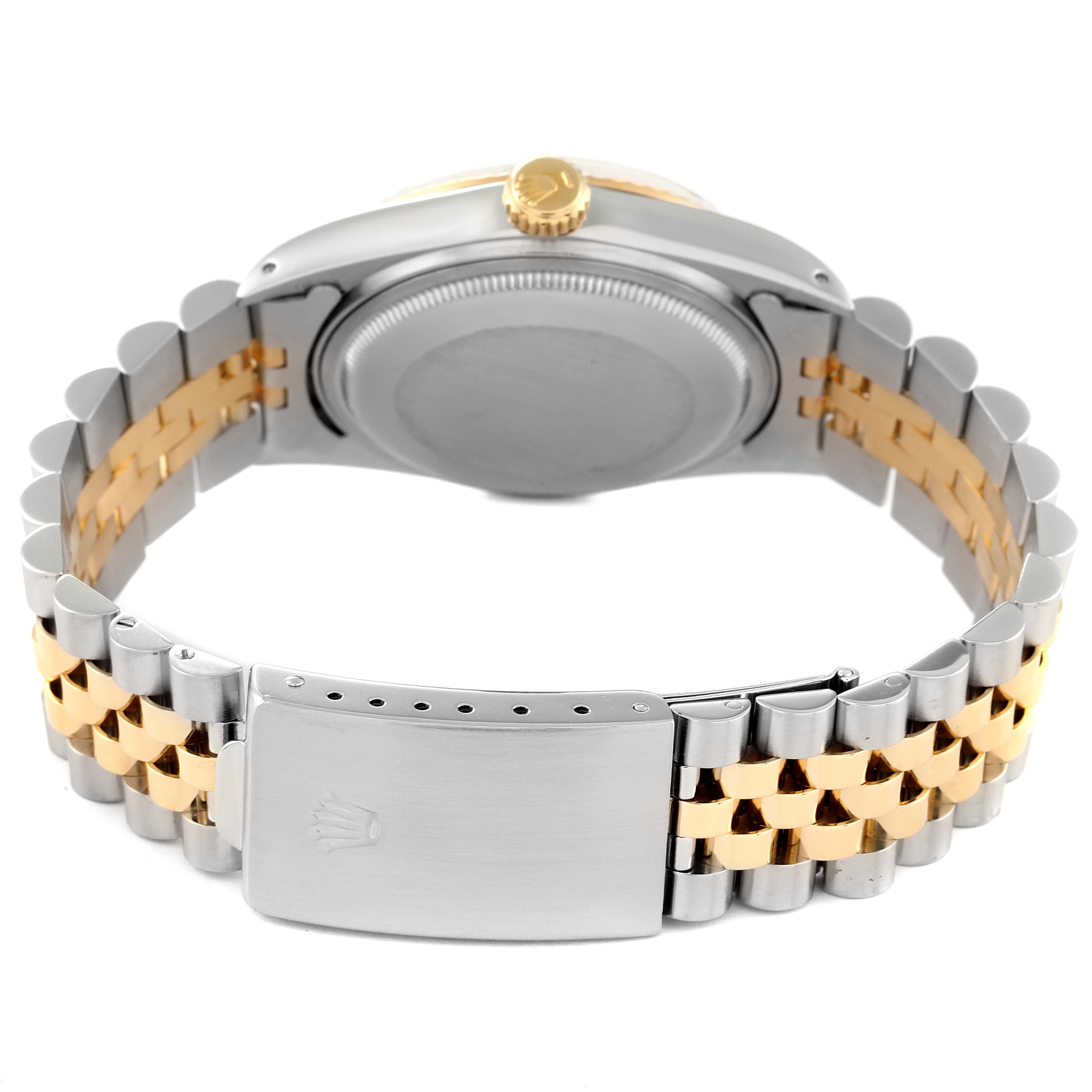 The image shows the back view of a Vintage Collection Rolex watch, featuring the case back, crown, and two-tone bracelet with a clasp.