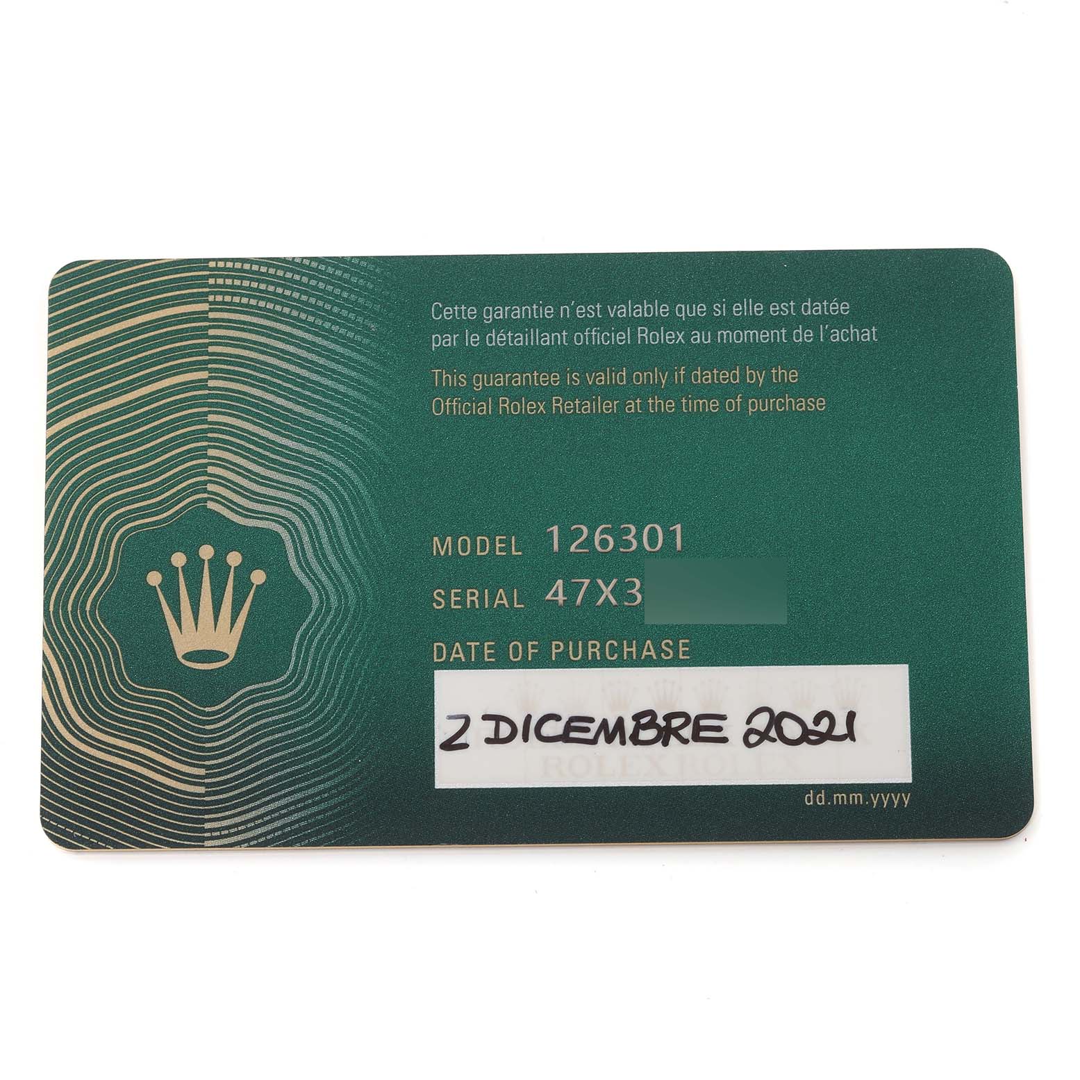 This image shows a warranty card for the Rolex Datejust 41 126301 Men's Steel and Gold (two tone) Grey Dial 126301 Men's Steel and Gold (two tone) Grey Dial model 126301, with purchase details and serial number.