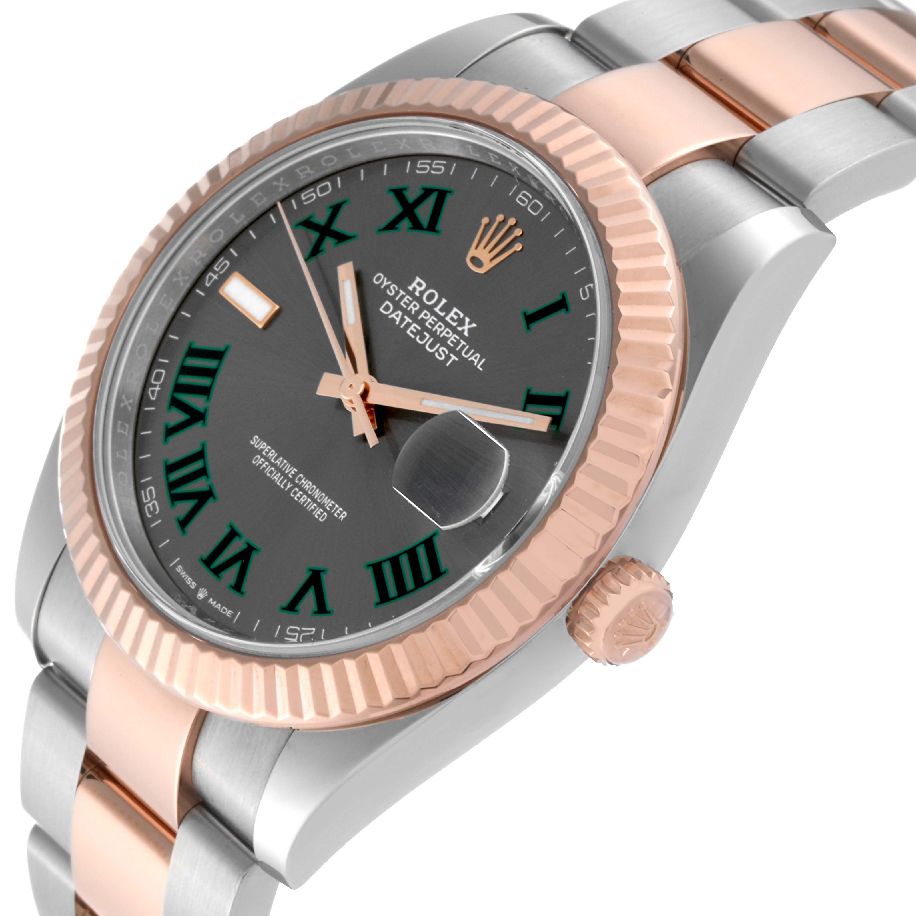 The Rolex Datejust 41 126331 Men's Steel and Gold (two tone) Grey Dial 126331 Men's Steel and Gold (two tone) Grey Dial watch is shown from an angled close-up, highlighting the face, bezel, and part of the bracelet.