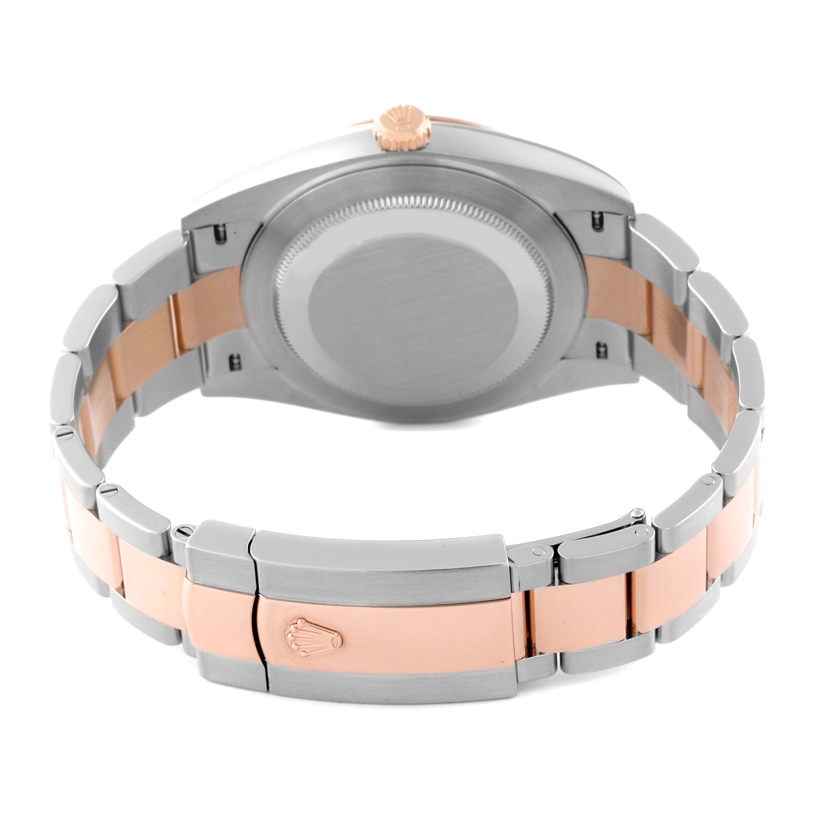 The image shows the back of a Rolex Datejust 41 126331 Men's Steel and Gold (two tone) Grey Dial 126331 Men's Steel and Gold (two tone) Grey Dial watch, highlighting its two-tone metal bracelet and clasp with Rolex branding.