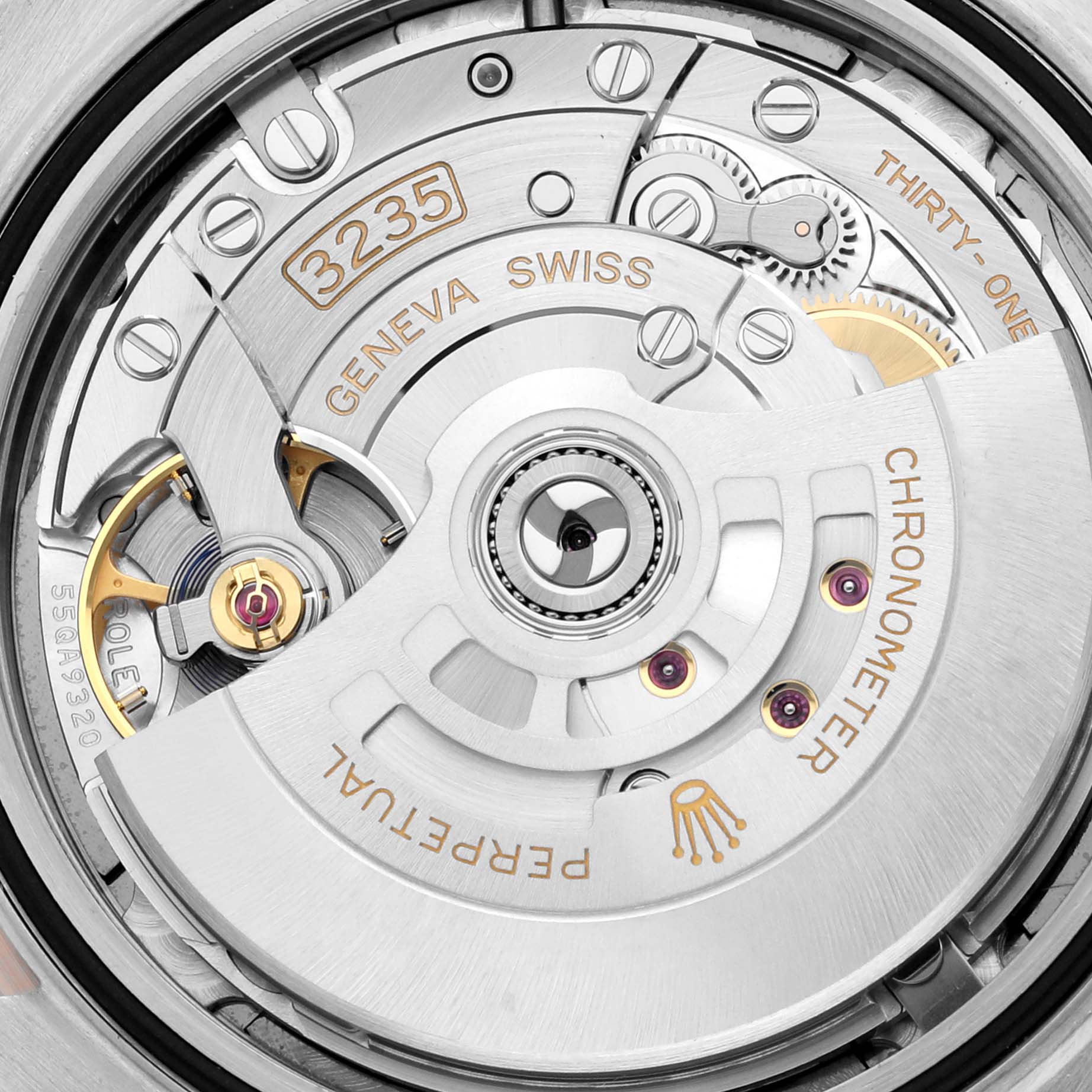 This image shows the inner mechanism of the Rolex Datejust 41 126331 Men's Steel and Gold (two tone) Grey Dial 126331 Men's Steel and Gold (two tone) Grey Dial, highlighting the movement and intricate components.