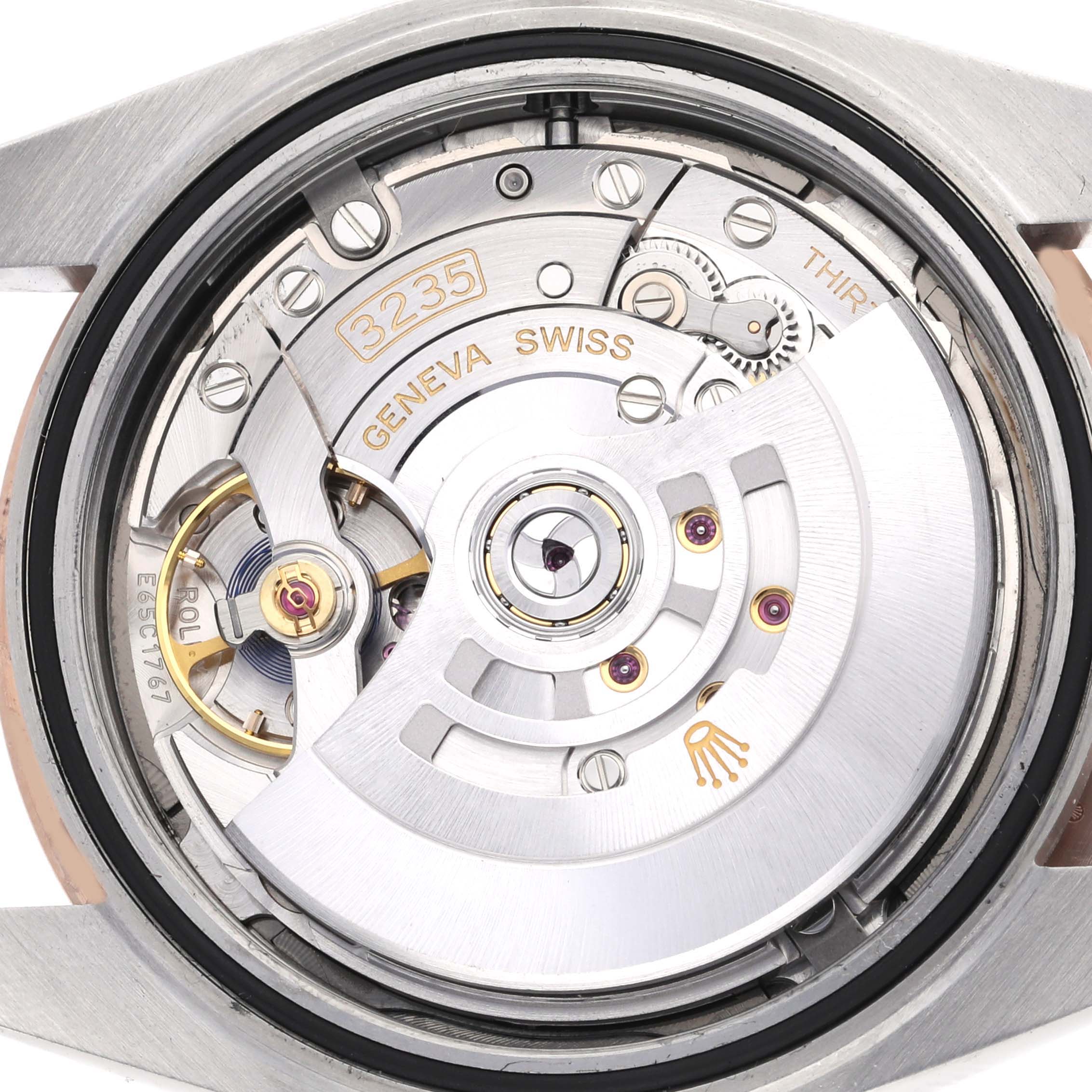 This image shows the back of a Rolex Datejust 41 126331 Men's Steel and Gold (two tone) Grey Dial 126331 Men's Steel and Gold (two tone) Grey Dial watch, revealing its intricate 3235 movement mechanism.