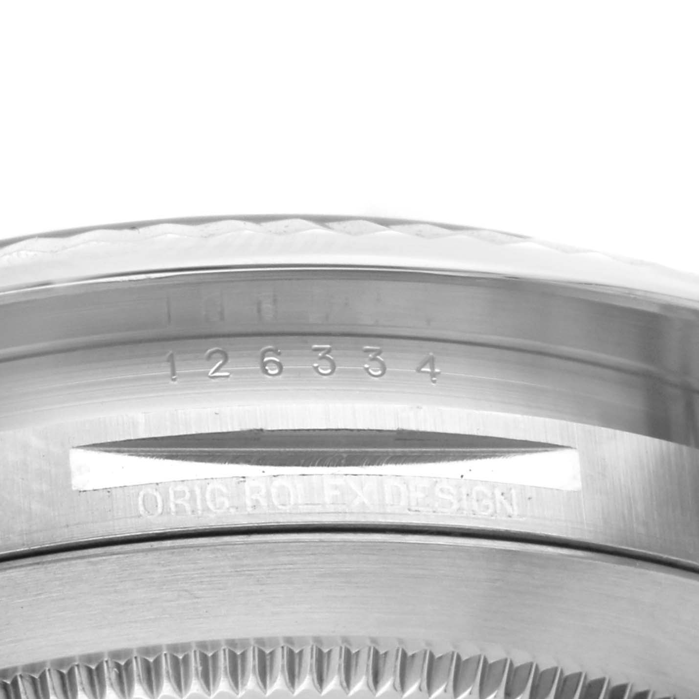 The image shows a close-up of the case back edge and serial number engraving on the Rolex Datejust 41 126334 Men's Stainless Steel Grey Dial 126334 Men's Stainless Steel Grey Dial model.
