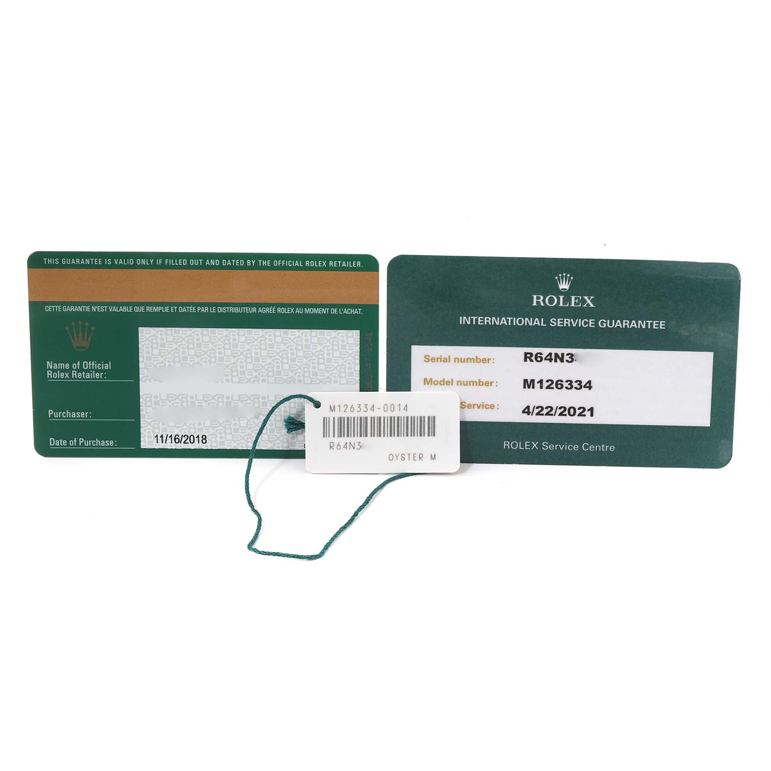 The image shows the warranty and service cards for a Rolex Datejust 41 126334 Men's Stainless Steel Grey Dial 126334 Men's Stainless Steel Grey Dial model along with a tag displaying its model number.