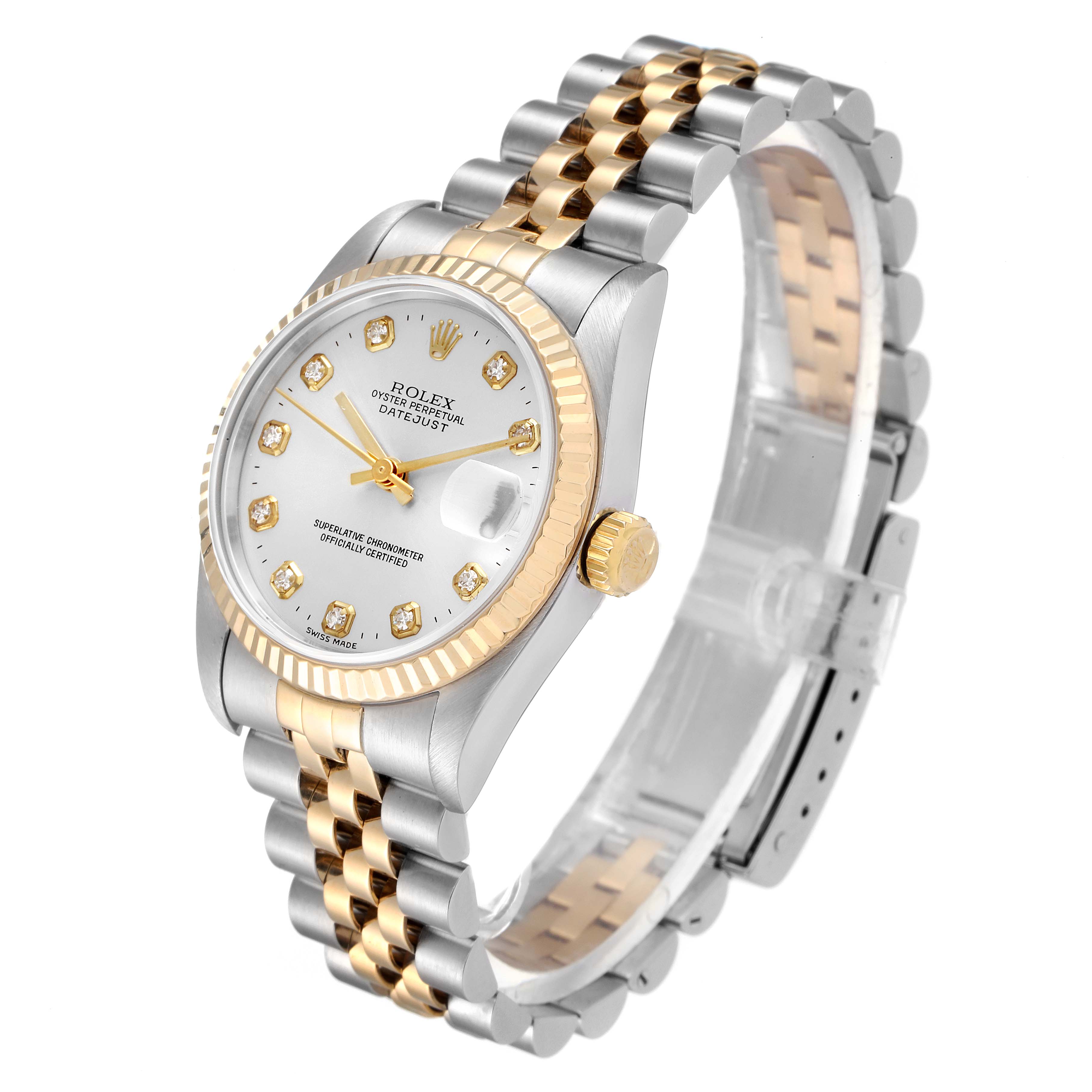 The image shows a Rolex Mid-Size 68273 Women
s Steel and Gold (two tone) Silver Dial 68273 Women
s Steel and Gold (two tone) Silver Dial model from a three-quarter angle, highlighting its two-tone bracelet, dial, and bezel.