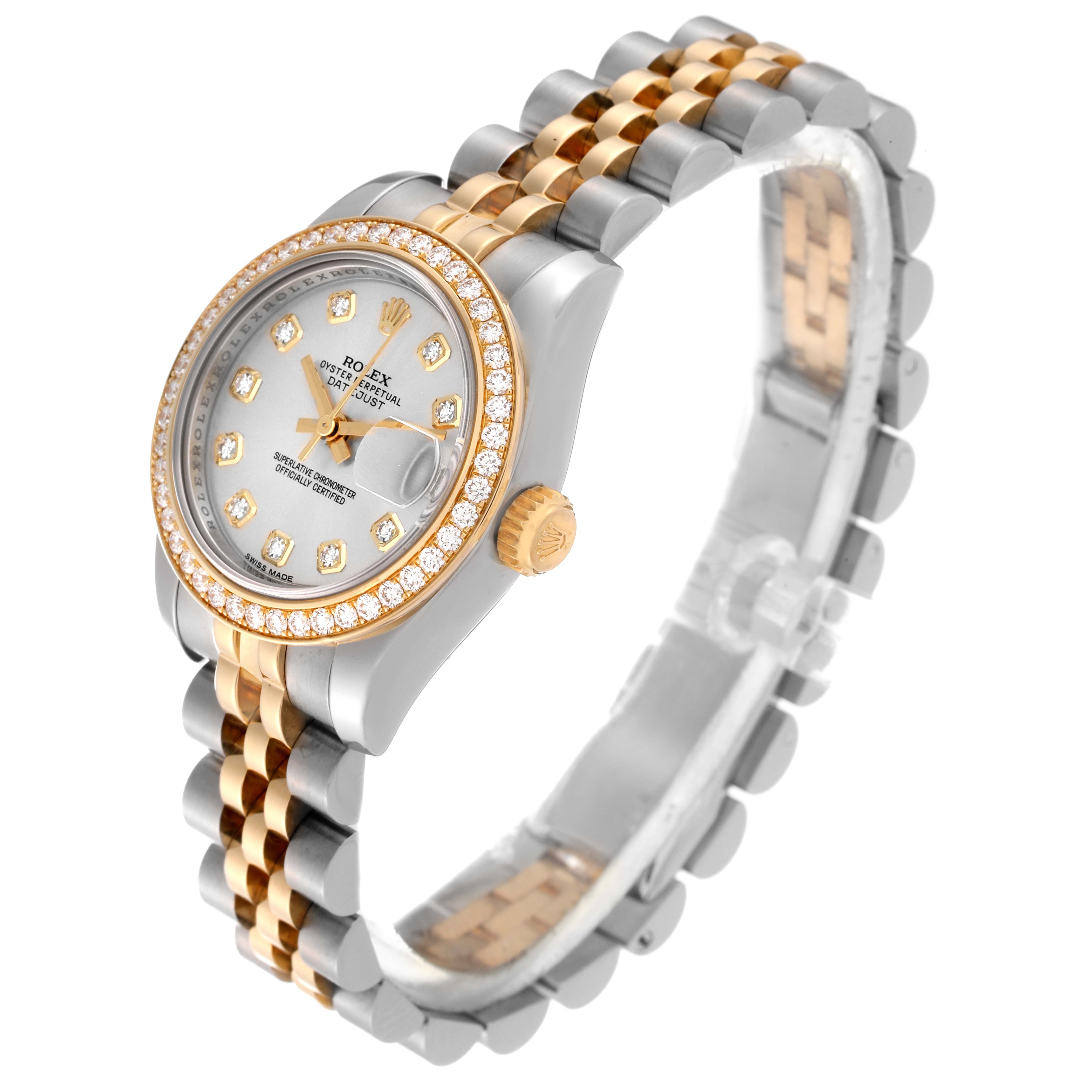 This is a Rolex Datejust 179383 Women's Steel and Gold (two tone) Silver Dial 179383 Women's Steel and Gold (two tone) Silver Dial watch shown from an angled side view, showcasing the dial, bezel, crown, and part of the bracelet.