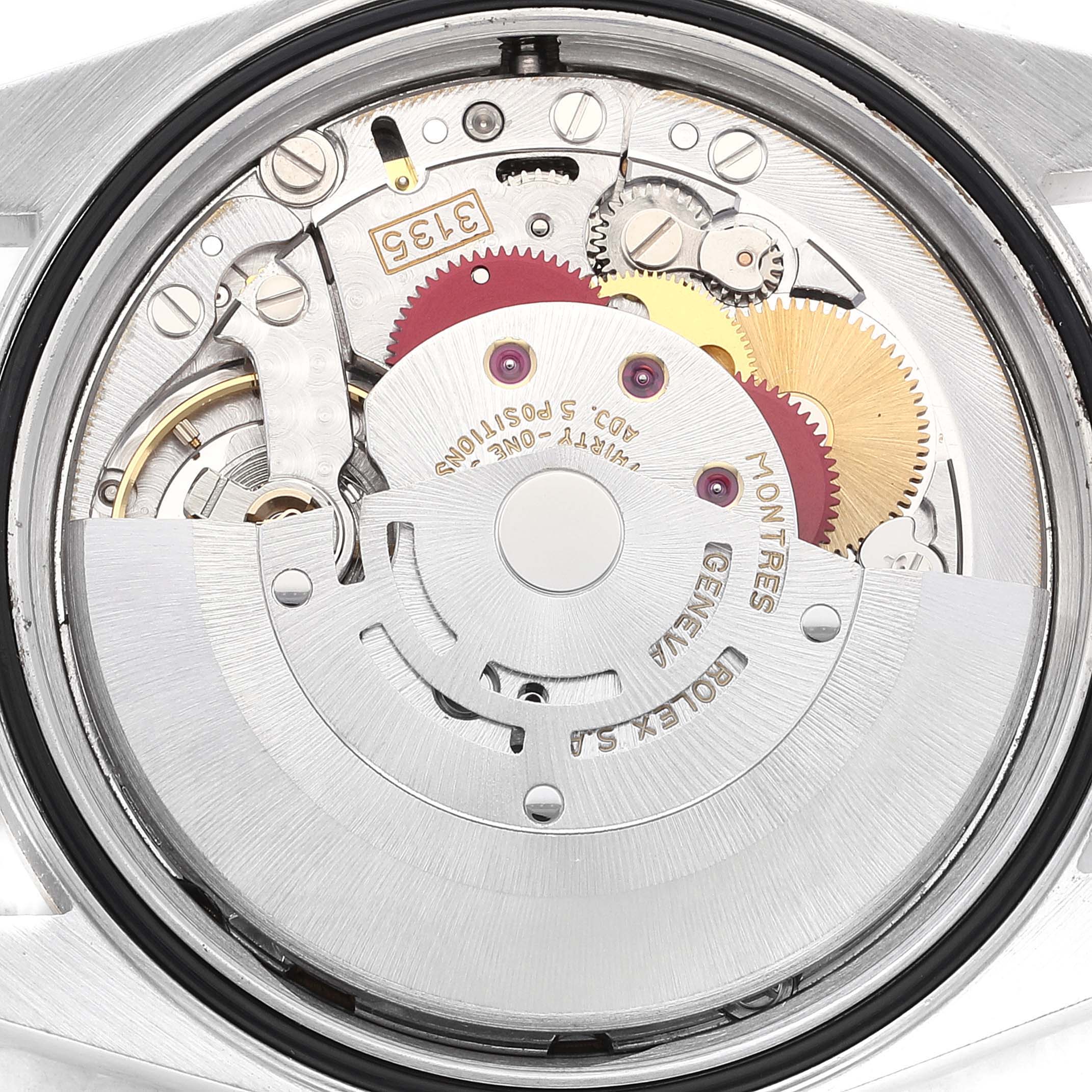 The image shows the movement and internal components of a Rolex Datejust 16233 Men's Steel and Gold (two tone) White Dial 16233 Men's Steel and Gold (two tone) White Dial watch from the back view.