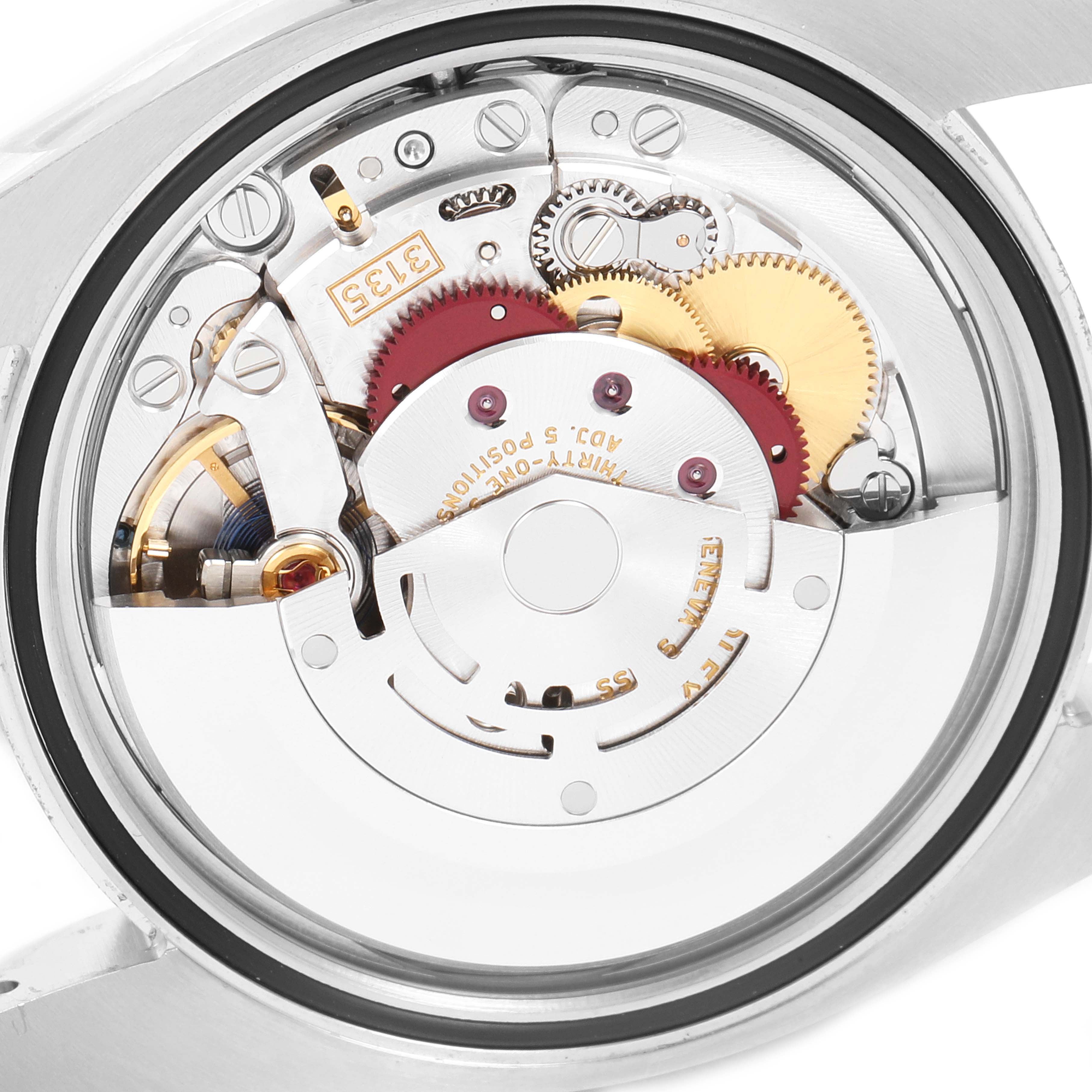 The image shows the transparent case back revealing the intricate movement details of the Rolex Datejust 116234 Men's Stainless Steel Blue Dial 116234 Men's Stainless Steel Blue Dial watch.