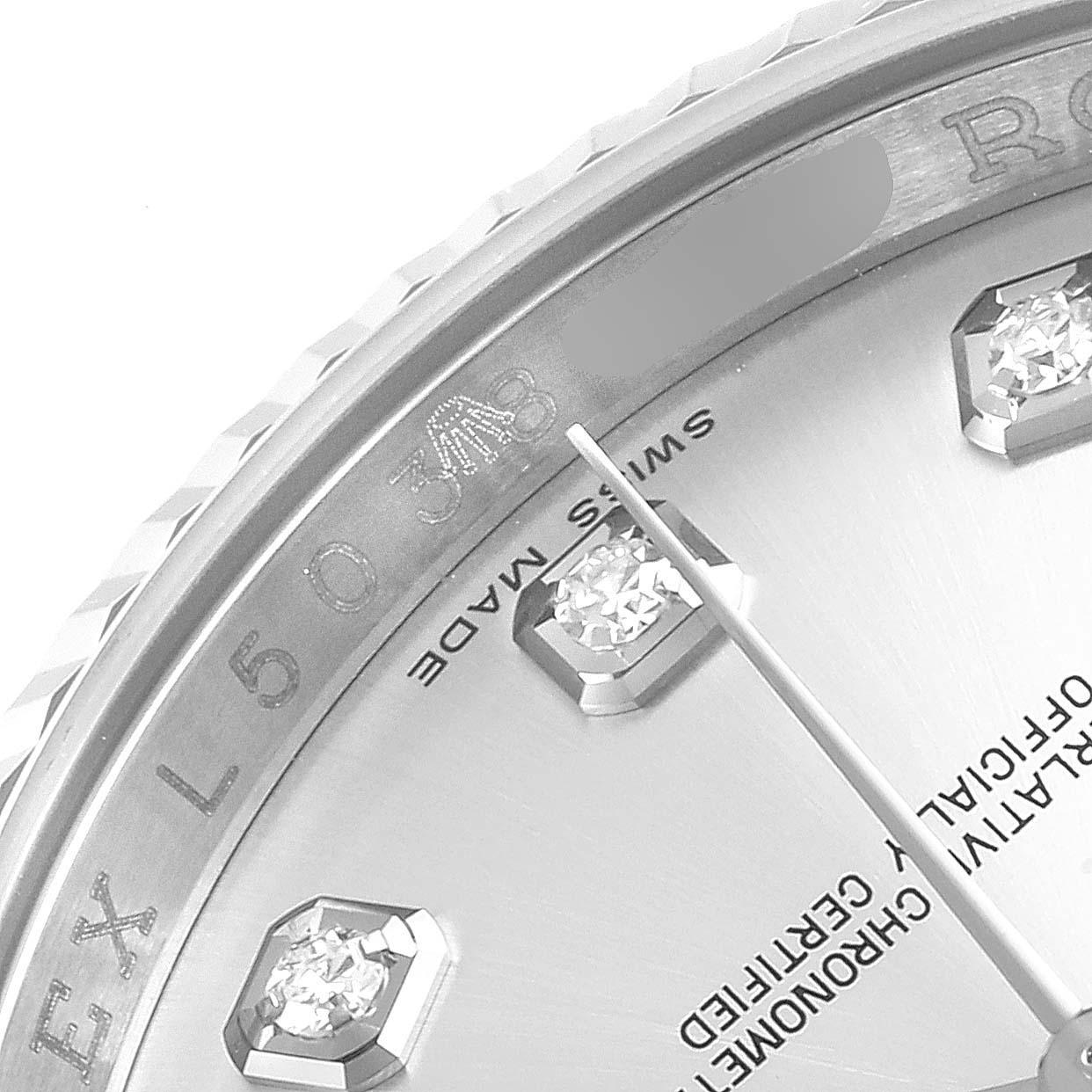This is a close-up view of the dial of a Rolex Datejust 116234 Men's Stainless Steel Silver Dial 116234 Men's Stainless Steel Silver Dial watch, showcasing its diamond hour markers and part of the bezel.