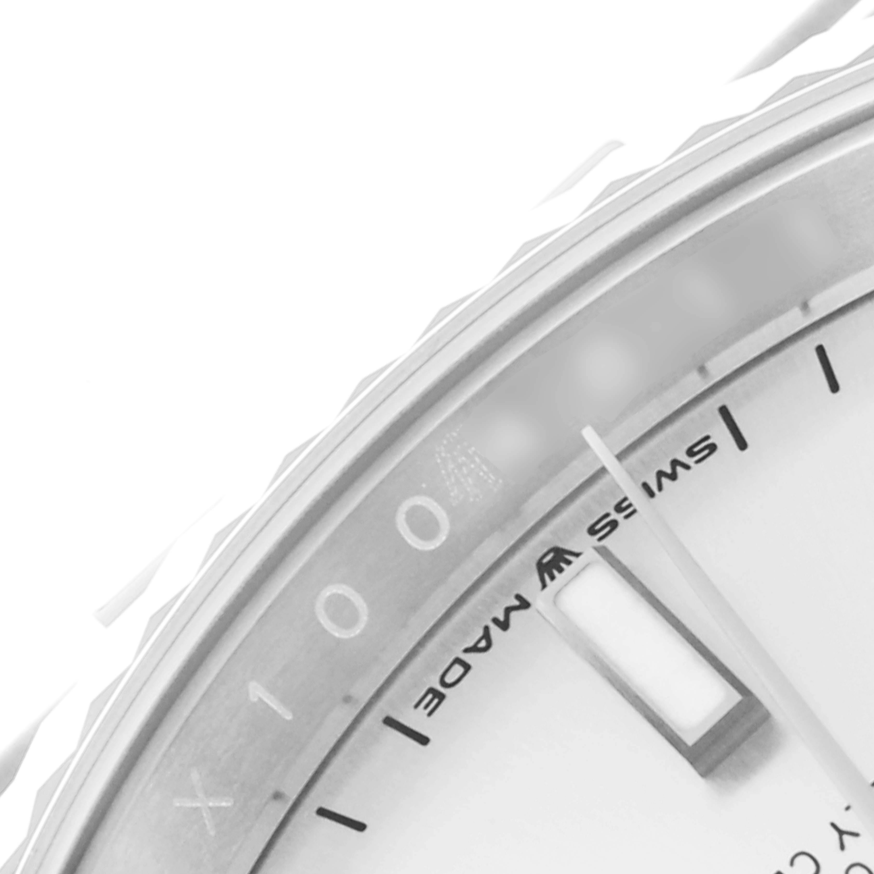This image shows a close-up of the dial and bezel of a Rolex Datejust 126234 Men's Stainless Steel Silver Dial 126234 Men's Stainless Steel Silver Dial watch, highlighting the "Swiss Made" text and part of an index marker.