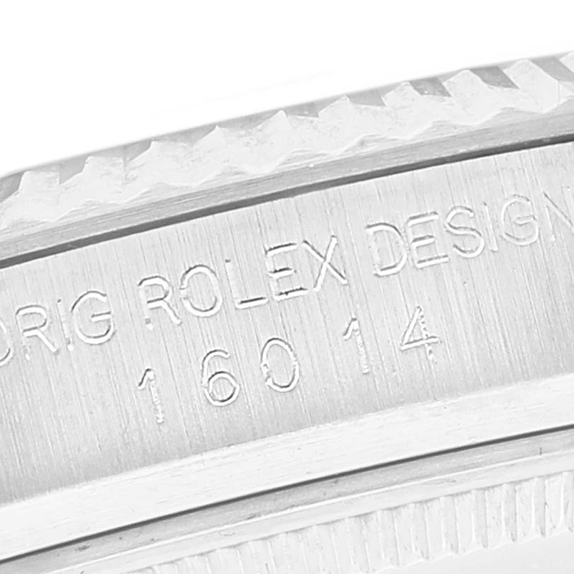 This close-up image shows the engraved model number "16014" on the case of a Rolex Vintage Collection 16014 Men
s Stainless Steel Silver Dial 16014 Men
s Stainless Steel Silver Dial watch.