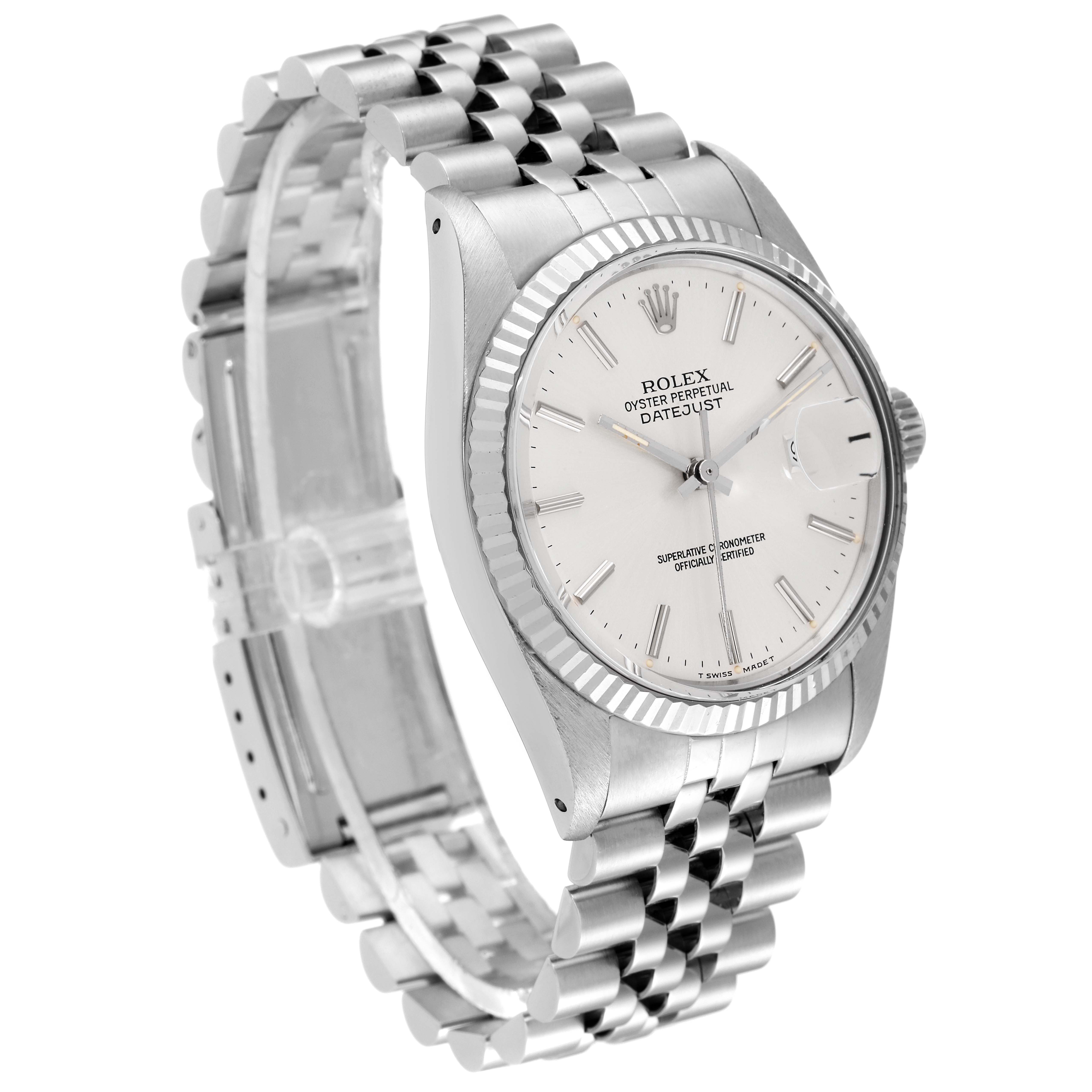 The image shows a side and front angle of the Rolex Vintage Collection 16014 Men
s Stainless Steel Silver Dial 16014 Men
s Stainless Steel Silver Dial Oyster Perpetual Datejust watch with a metal bracelet.