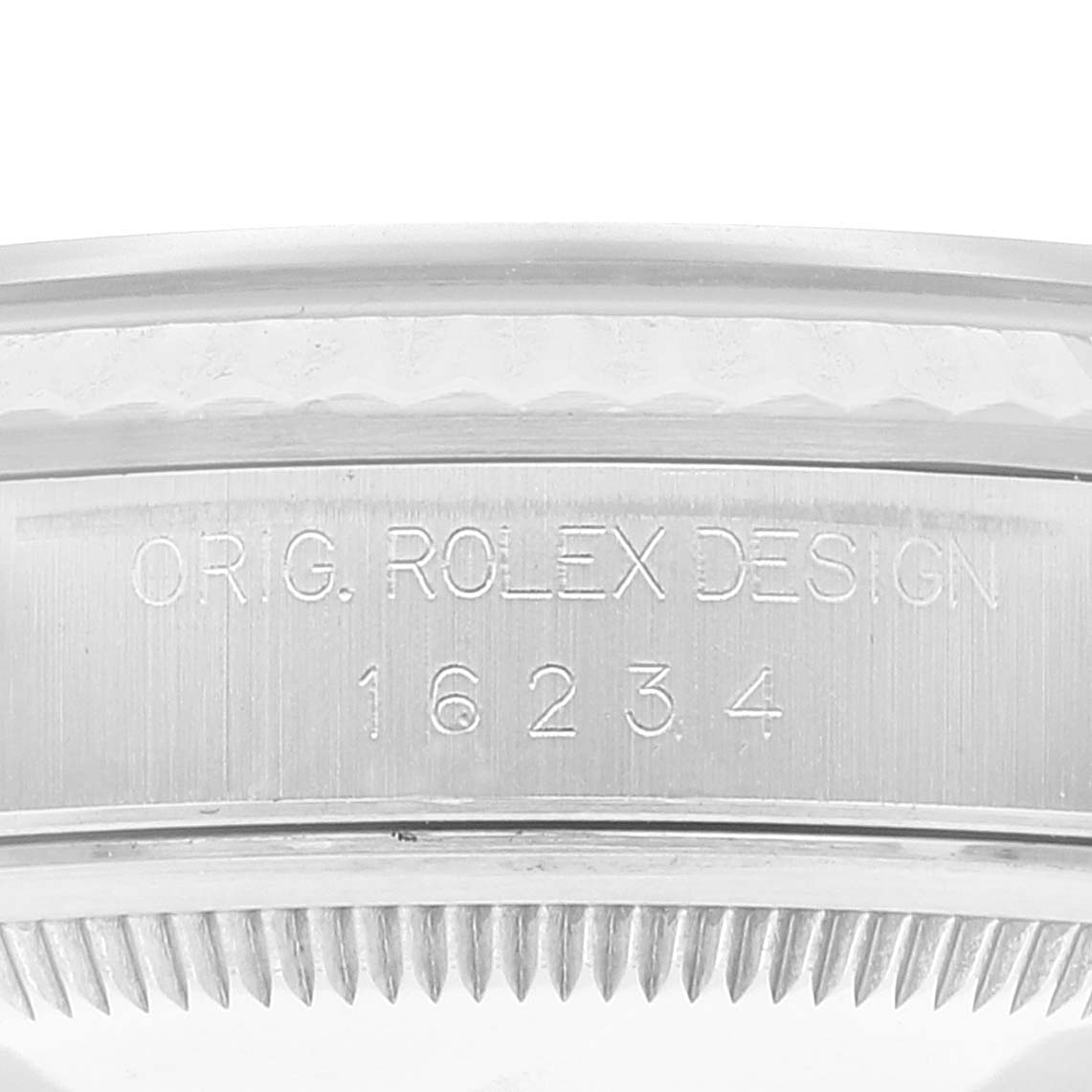This image shows a close-up of the side casing of a Rolex Datejust 16234 Men's Stainless Steel Silver Dial 16234 Men's Stainless Steel Silver Dial watch with engraved model number 16234.