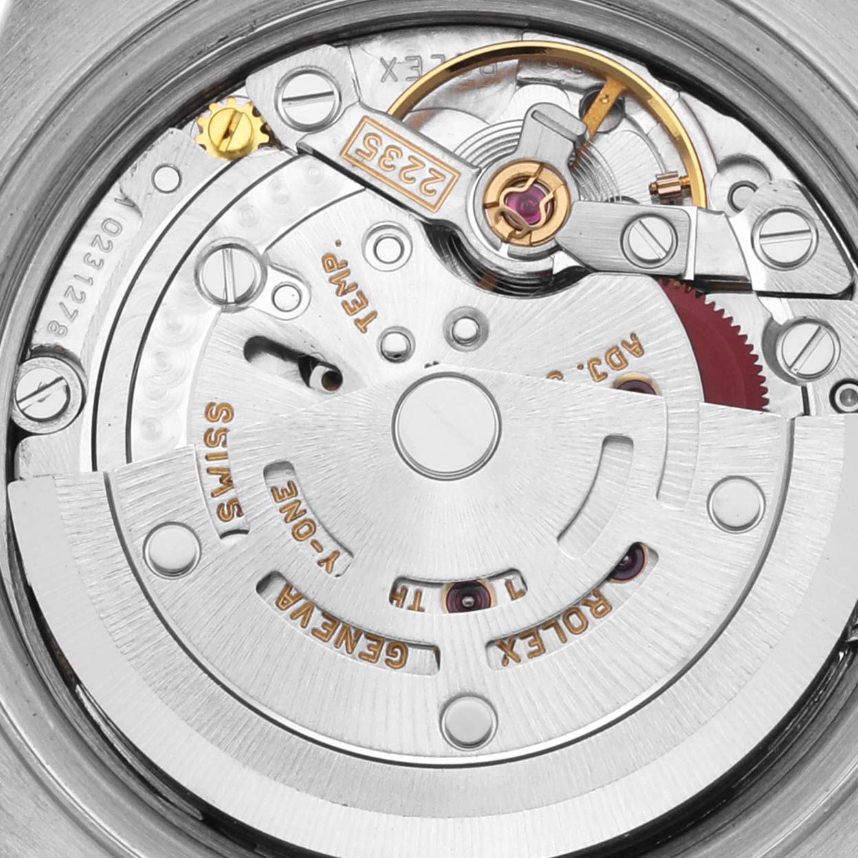 This is a close-up view of the movement mechanism of the Rolex Datejust 79173 Women's Steel and Gold (two tone) Blue Dial 79173 Women's Steel and Gold (two tone) Blue Dial watch, showing intricate gears and components.