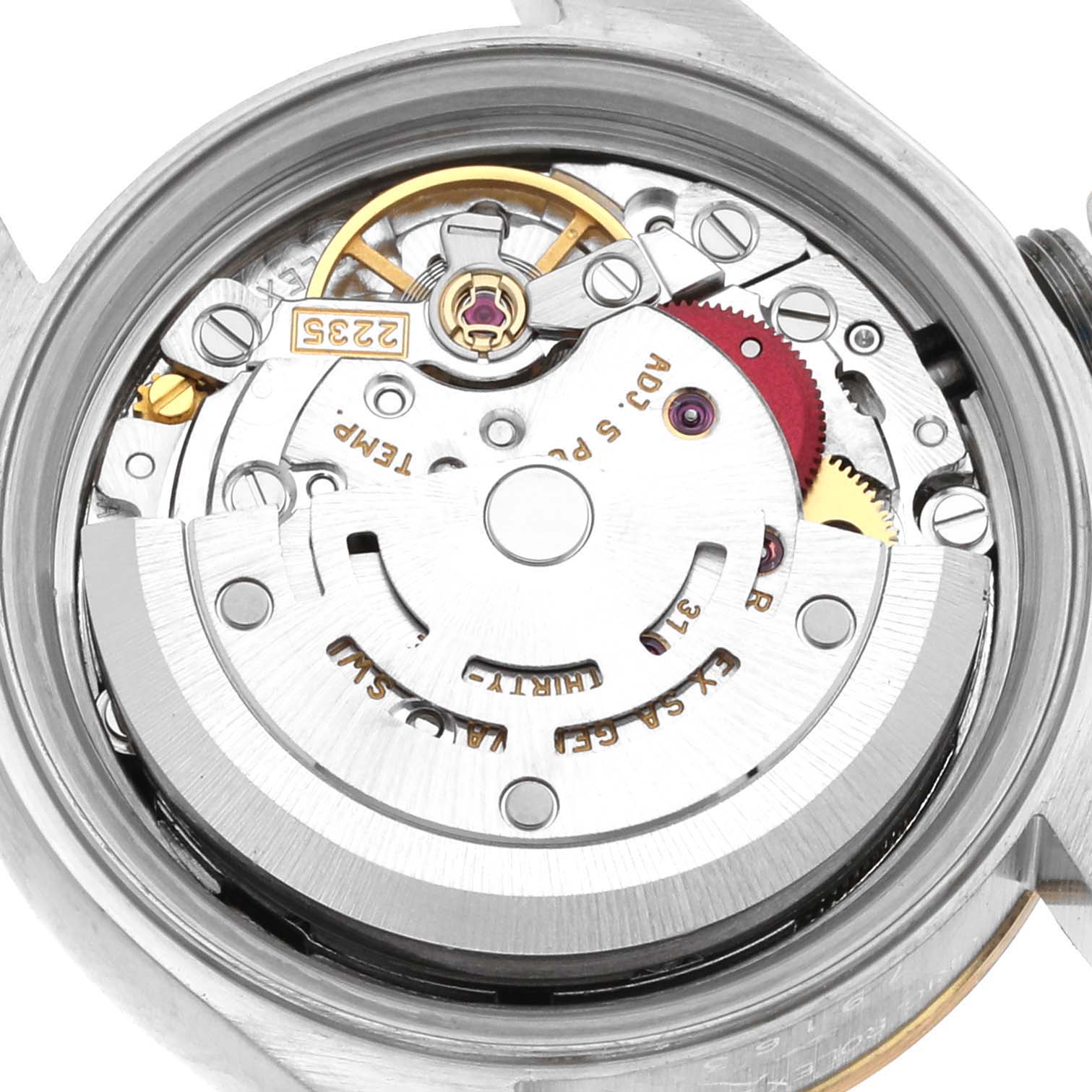 This image shows a close-up of the inner mechanical movement parts of a Rolex Datejust 79163 Women's Steel and Gold (two tone) Grey Dial 79163 Women's Steel and Gold (two tone) Grey Dial watch.