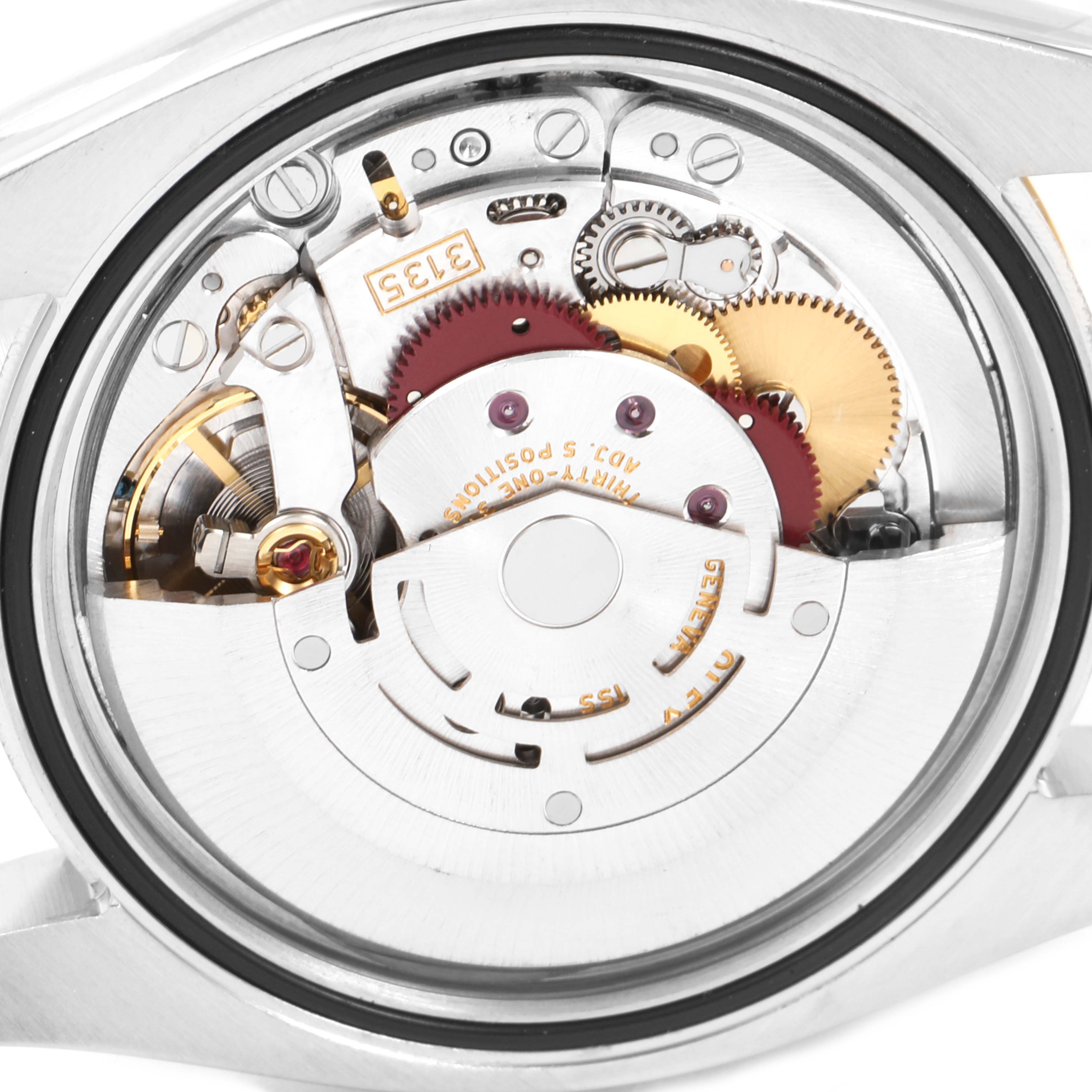 This image shows the internal mechanical movement of a Rolex Datejust 116233 Men's Steel and Gold (two tone) Black Dial 116233 Men's Steel and Gold (two tone) Black Dial watch viewed from the back.