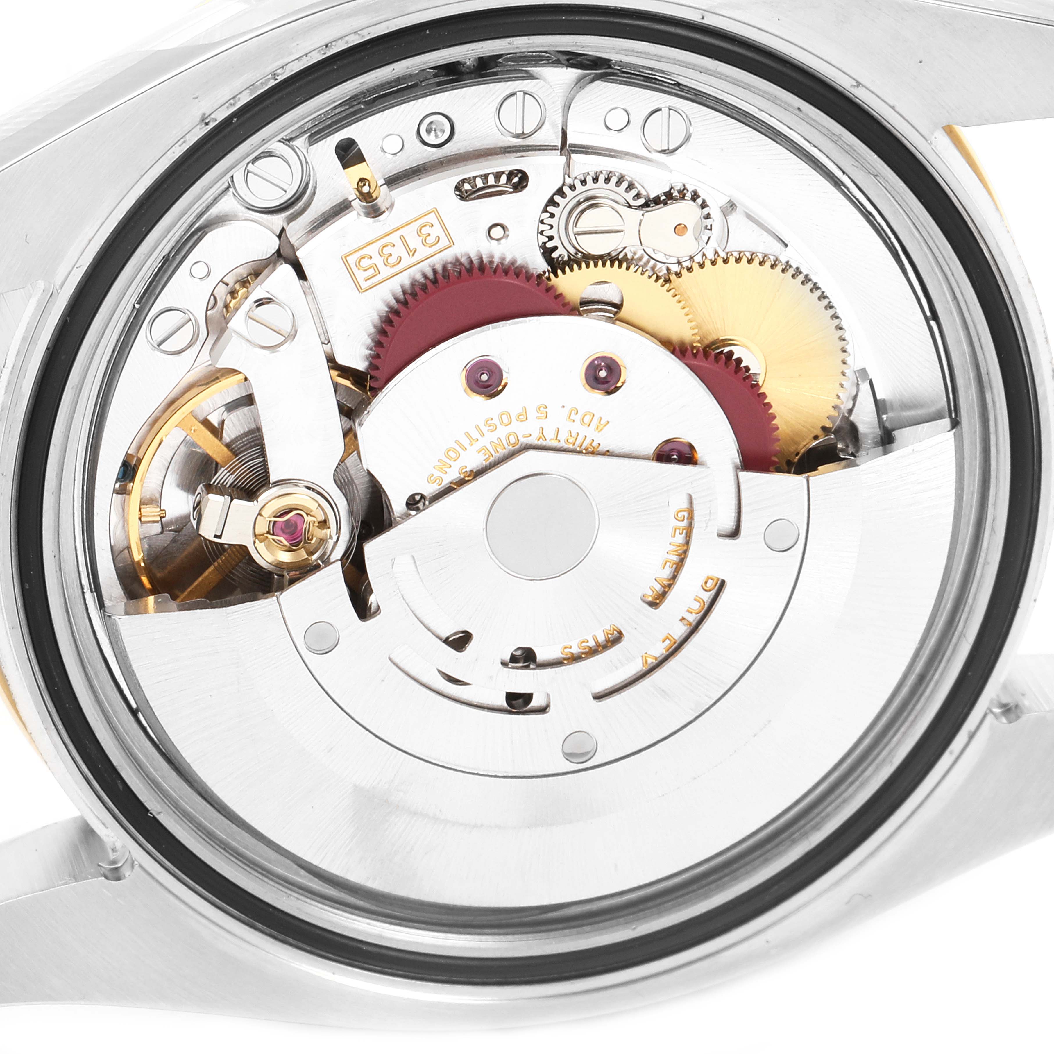 This image shows a close-up view of the movement and internal mechanisms of a Rolex Turn-o-Graph 116263 Men
s Steel and Gold (two tone) White Dial 116263 Men
s Steel and Gold (two tone) White Dial watch.