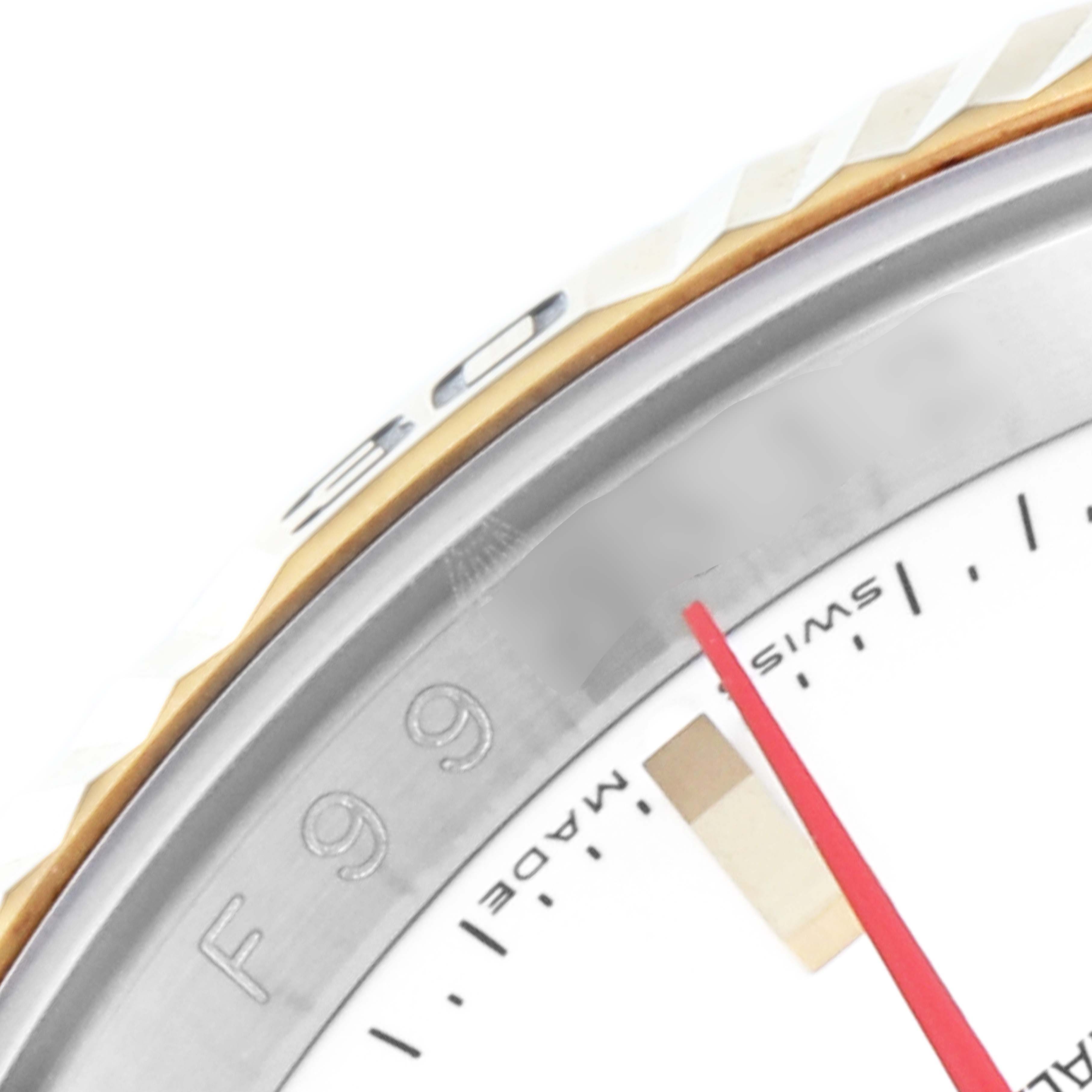 This is a close-up of the bezel and part of the dial of a Rolex Turn-o-Graph 116263 Men
s Steel and Gold (two tone) White Dial 116263 Men
s Steel and Gold (two tone) White Dial watch.