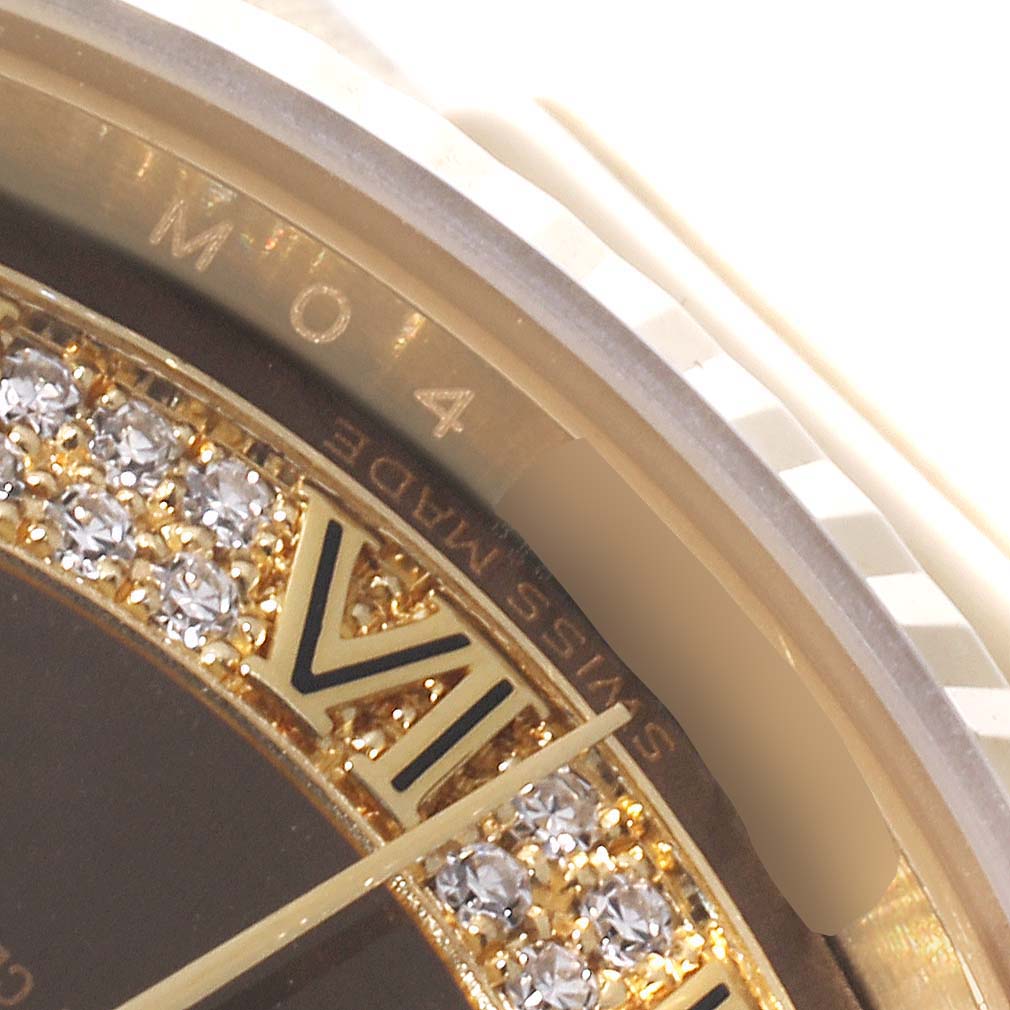 The close-up angle shows the dial and part of the bezel of a Rolex President 118238 Men's Yellow Gold Brown Dial 118238 Men's Yellow Gold Brown Dial model, highlighting the Roman numeral VI and diamond details.