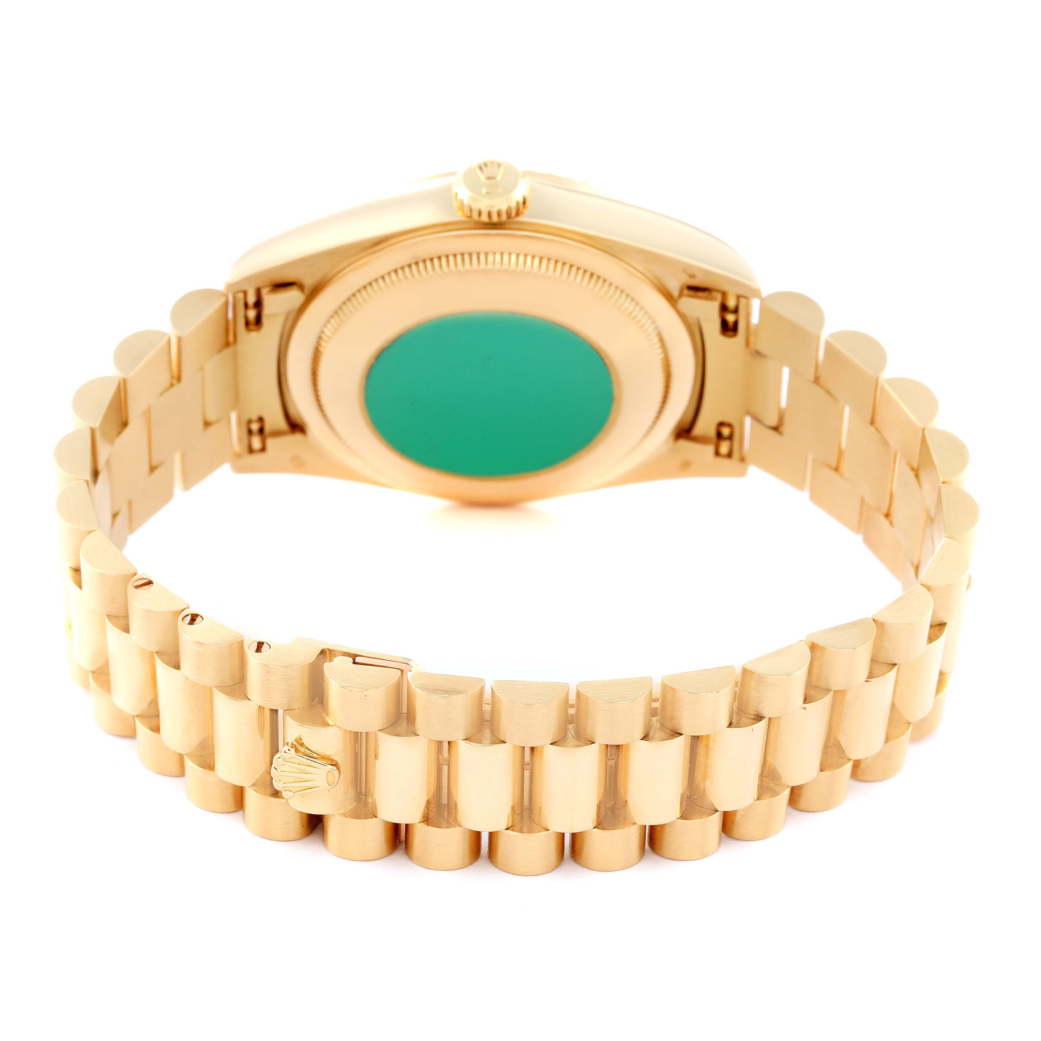 This image shows the back view of a Rolex President 18238 Men
s Yellow Gold Champagne Dial 18238 Men
s Yellow Gold Champagne Dial model watch, highlighting the case back and the bracelet.